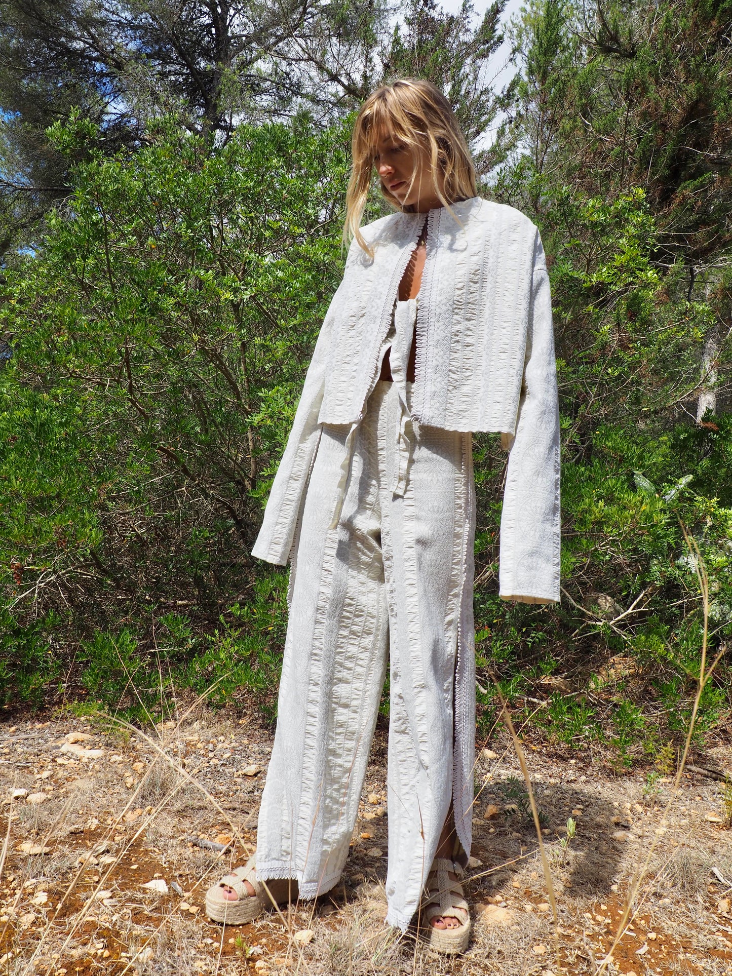 Up-cycled heavy cotton woven textile cropped jacket with super cool oversize long sleeves can be worn long as a statement made by Vagabond Ibiza