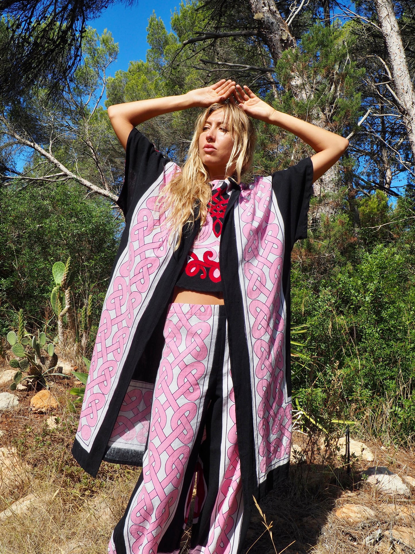 Up-cycled cotton short sleeve kimono jacket in pink and black with vibrant print design and circular motifs by Vagabond Ibiza