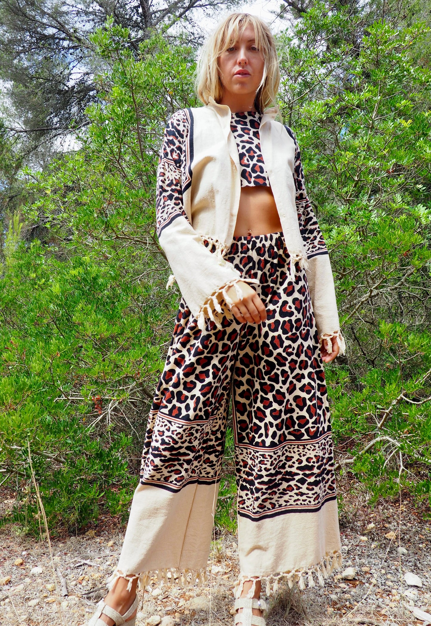 Up-cycled cotton black and cream animal print cropped jacket with tassels made by Vagabond Ibiza