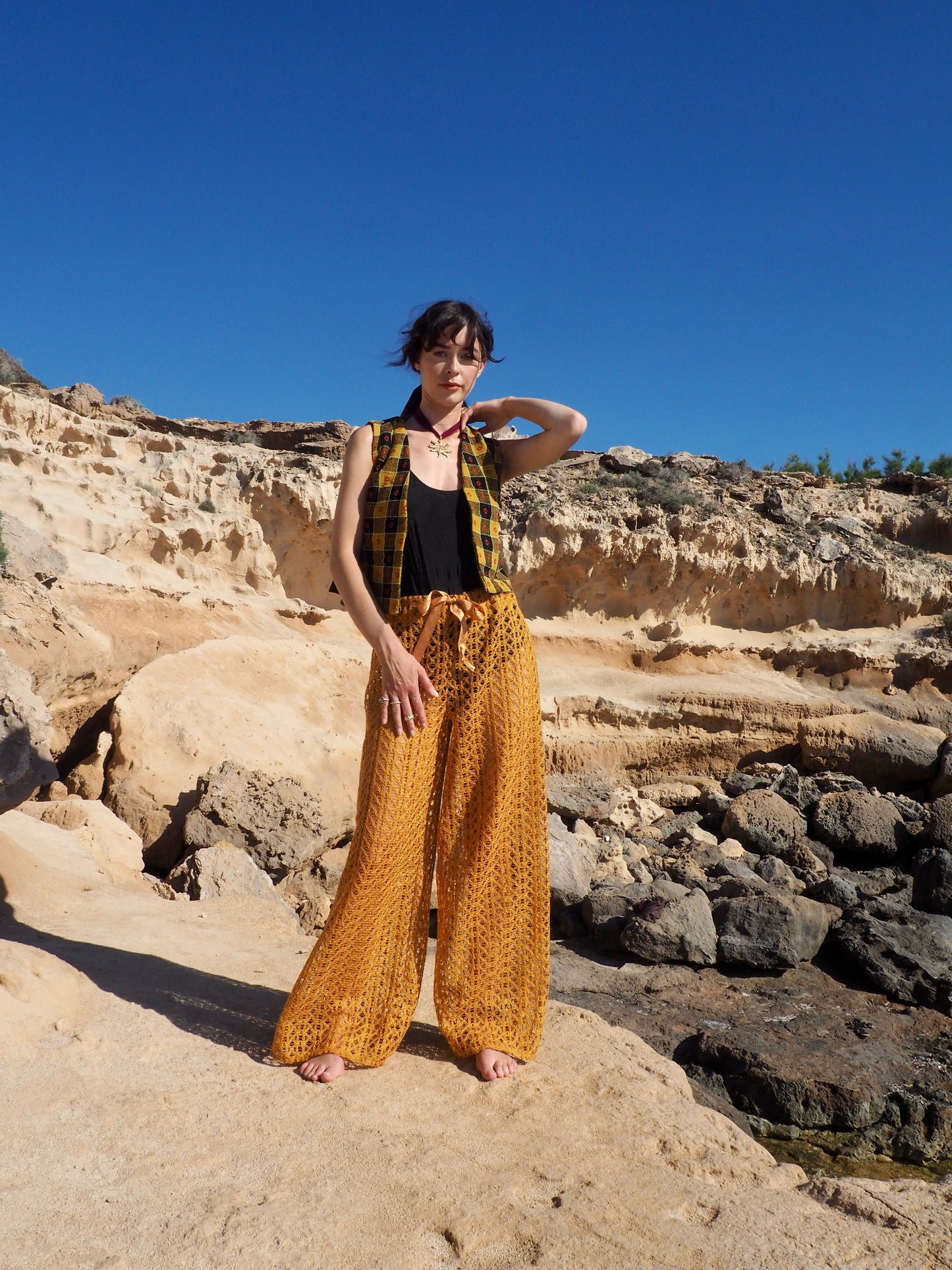 Up-cycled Mustard Yellow Wide-Leg Pants made from machine crochet textiles by Vagabond Ibiza