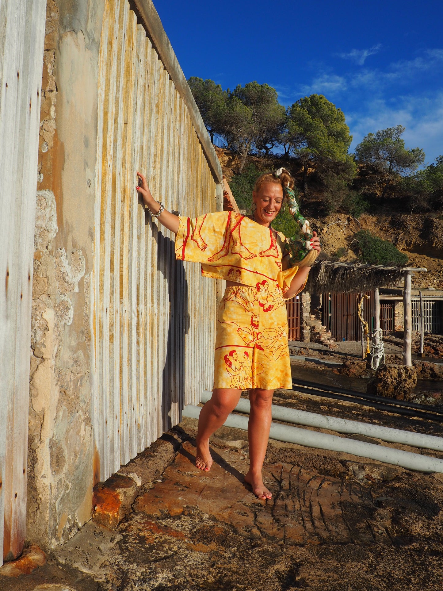 Up-cycled vintage cotton shorts with elastic waist and  printed karma sutra design mellow yellow