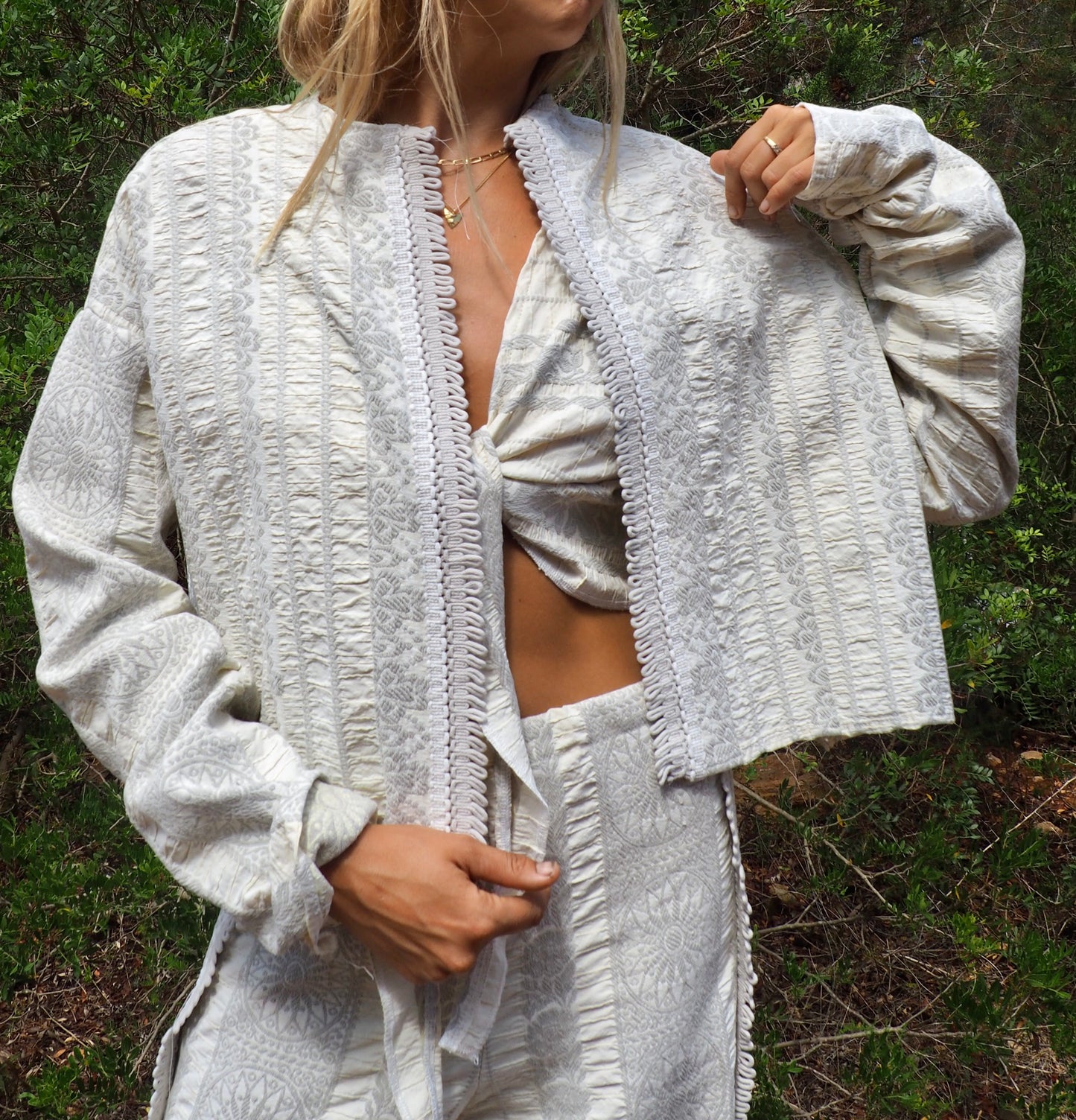 Up-cycled heavy cotton woven textile cropped jacket with super cool oversize long sleeves can be worn long as a statement made by Vagabond Ibiza