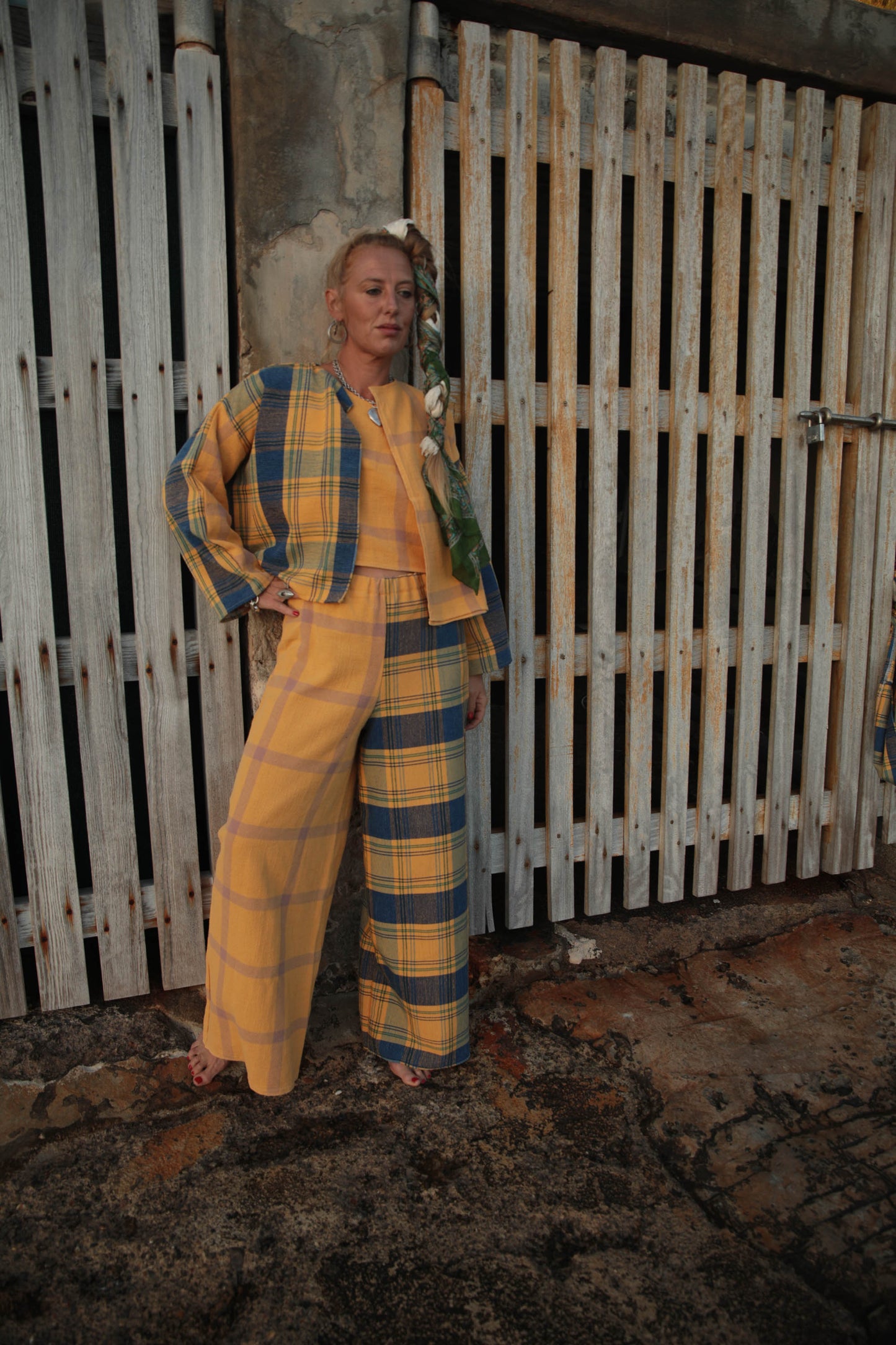 Up-cycled vintage cotton short jackets only from vintage textiles patch together with a yellow and blue checked design.