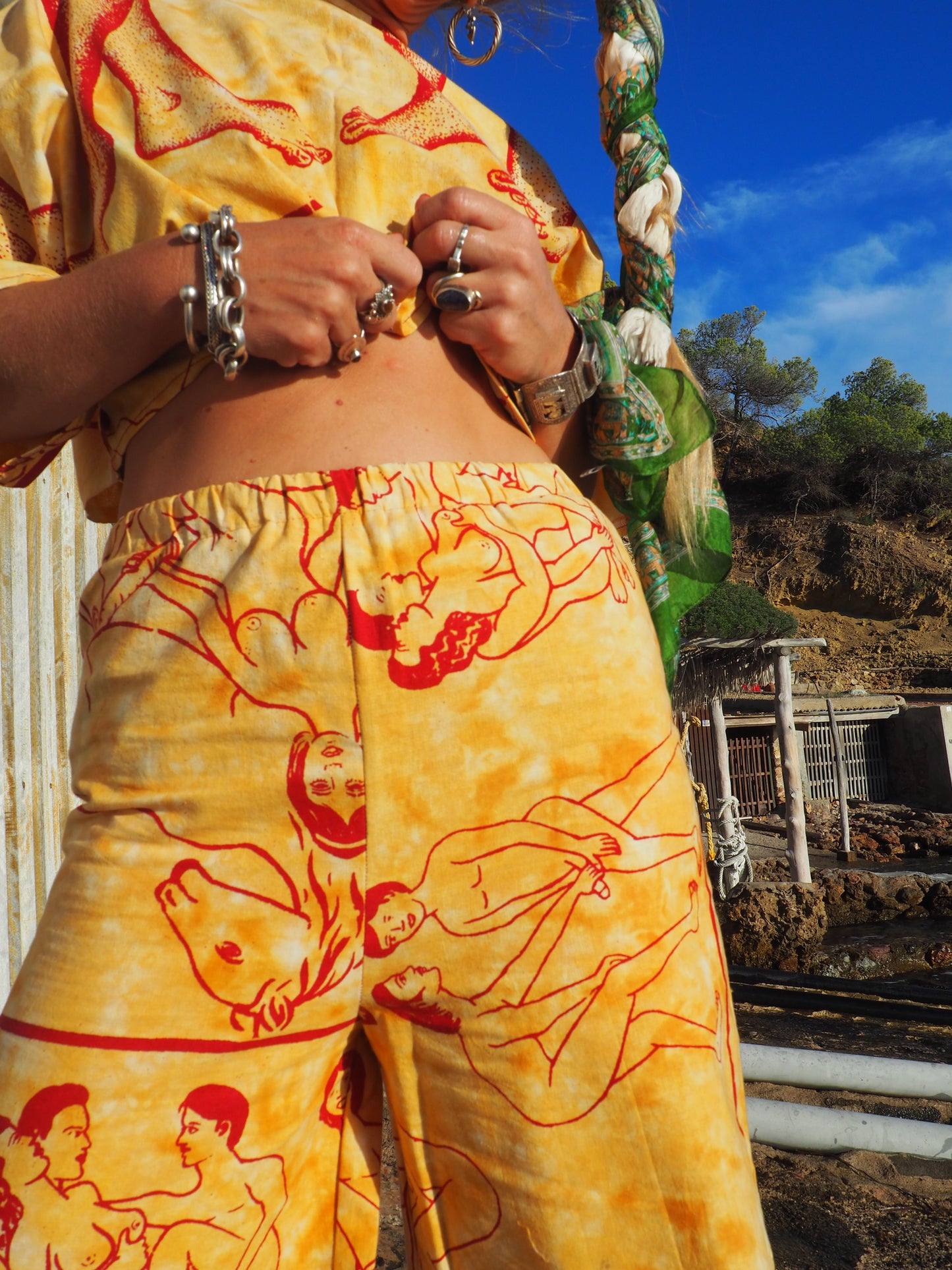 Up-cycled vintage cotton shorts with elastic waist and  printed karma sutra design mellow yellow