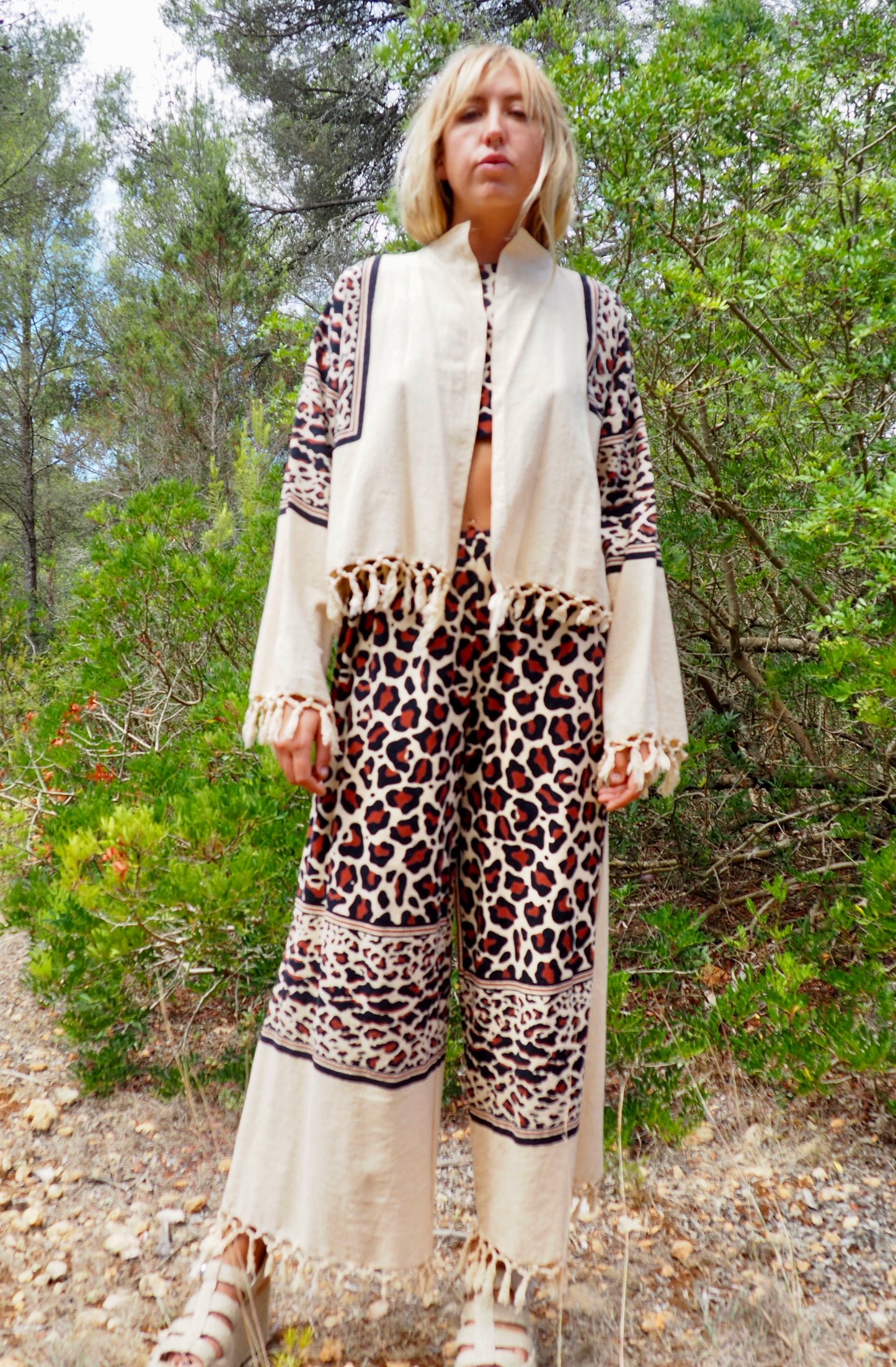 Up-cycled cotton black and cream animal print cropped jacket with tassels made by Vagabond Ibiza