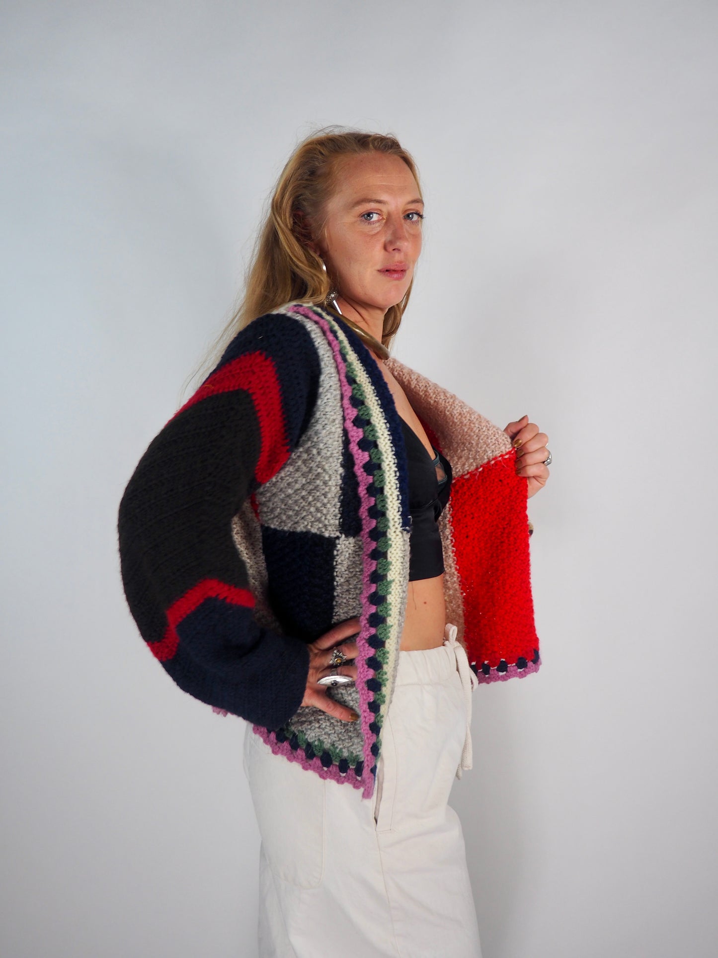 This one-of-a-kind vintage jacket is a true statement piece, crafted from a mix of cotton and wool crochet