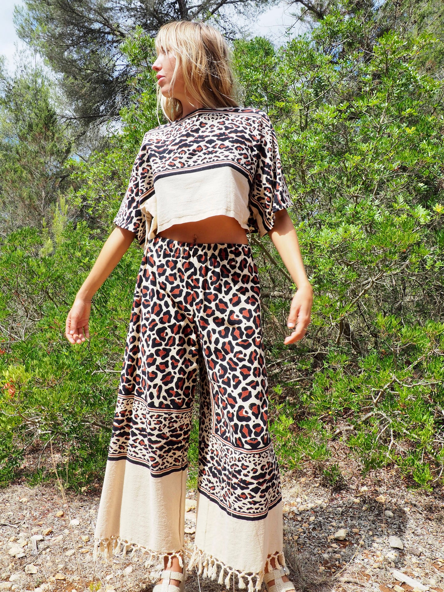 Up-cycled cotton black and cream animal print cropped top with sleeves made by Vagabond Ibiza