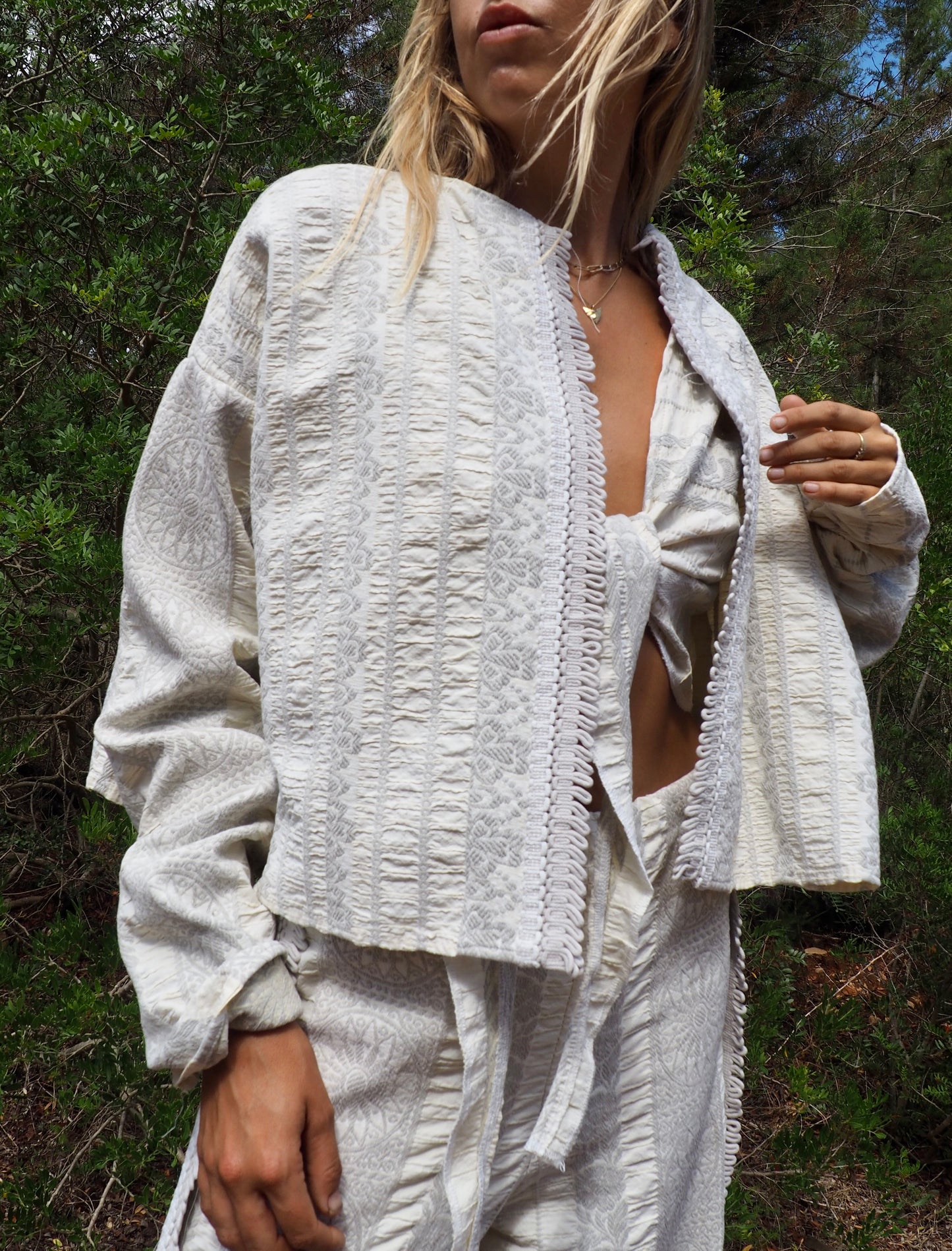 Up-cycled heavy cotton woven textile cropped jacket with super cool oversize long sleeves can be worn long as a statement made by Vagabond Ibiza