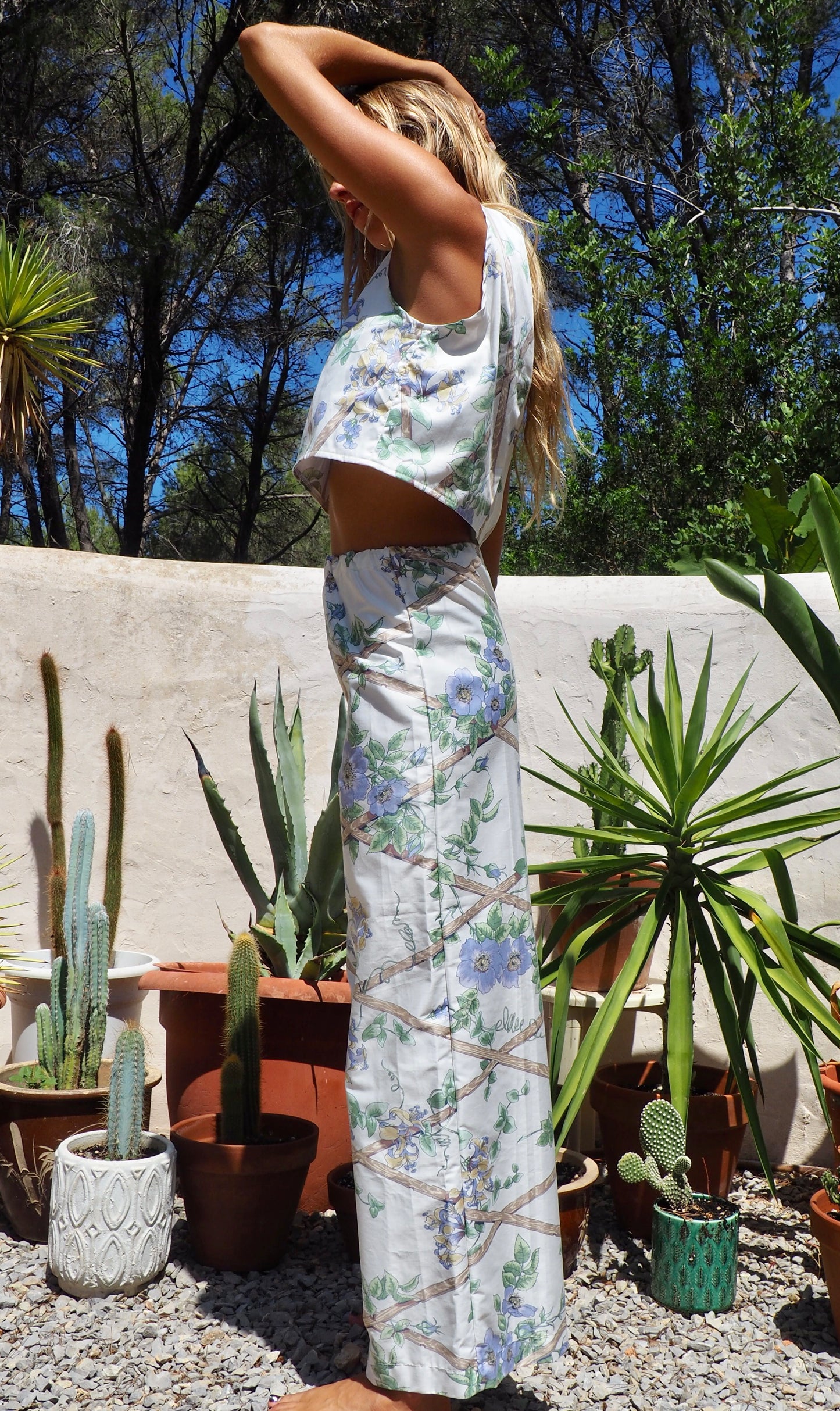 Up-cycled vintage garden floral printed textiles in white and blue wide leg pants with elasticated waist for fit by Vagabond Ibiza