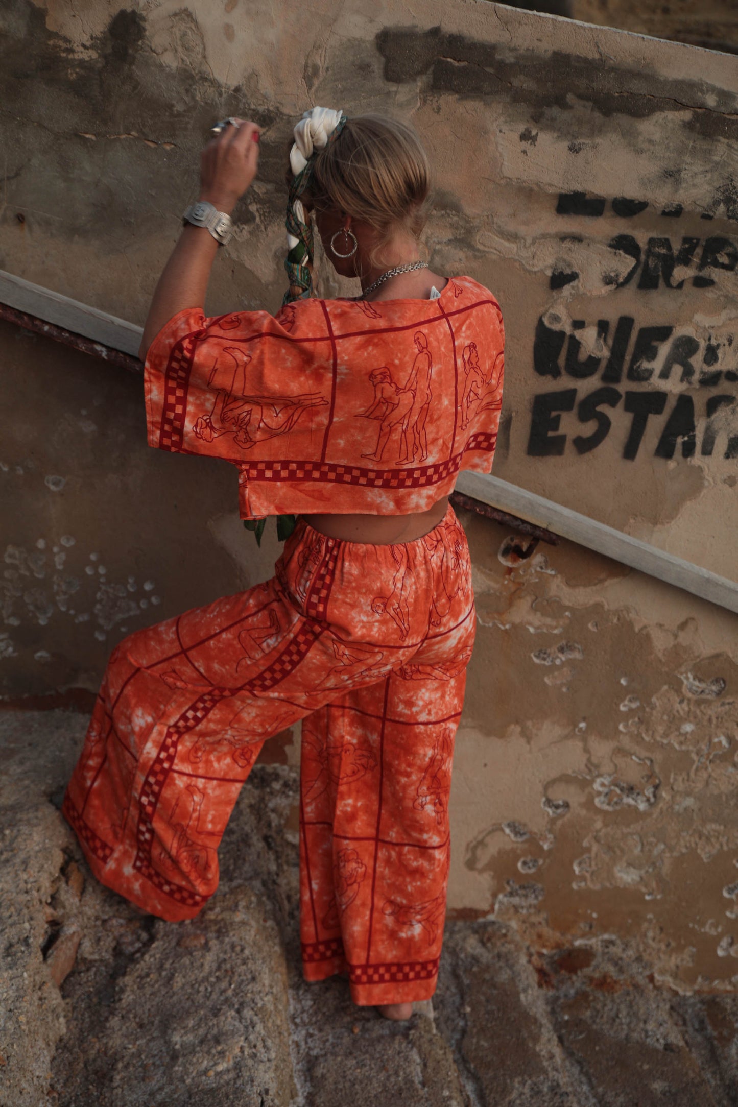 Up-cycled vintage cotton 2 piece set top and pants with printed karma sutra design in bright orange.