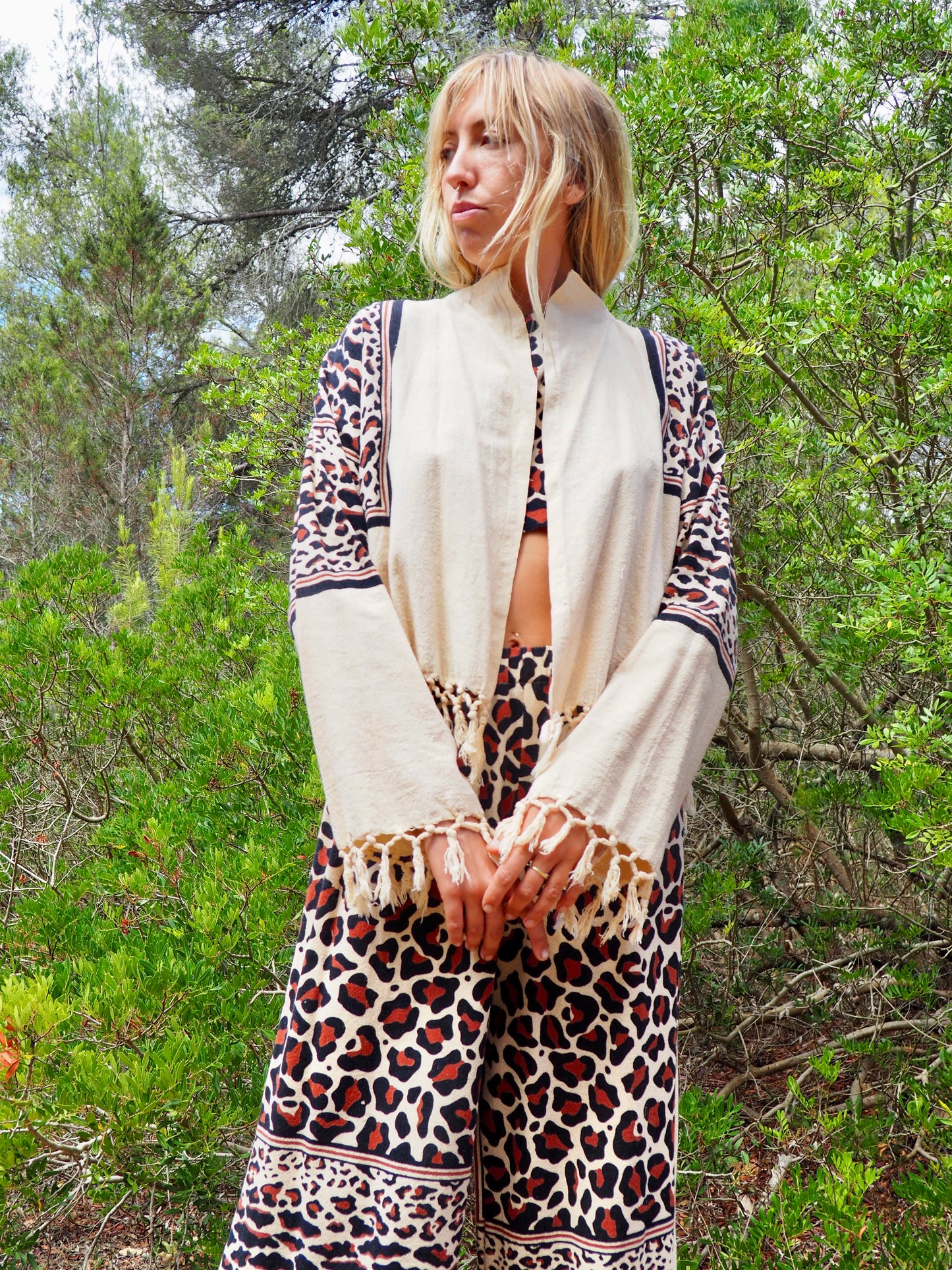 Up-cycled cotton black and cream animal print cropped jacket with tassels made by Vagabond Ibiza