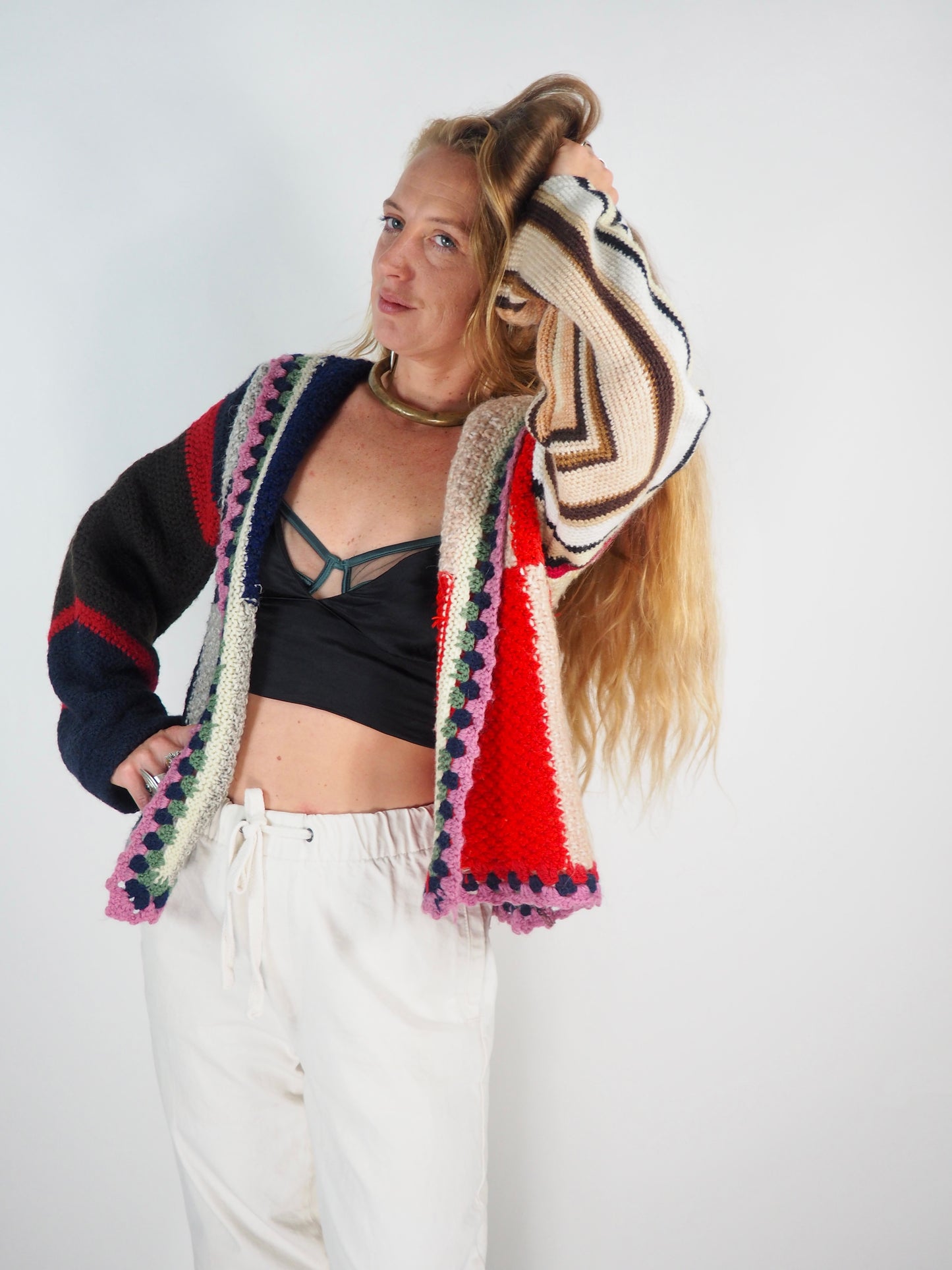 This one-of-a-kind vintage jacket is a true statement piece, crafted from a mix of cotton and wool crochet