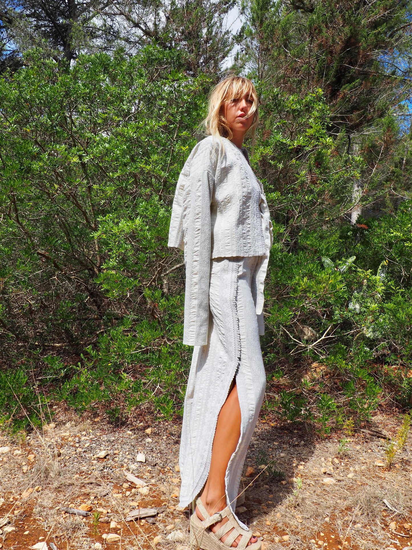 Up-cycled heavy cotton woven textile cropped jacket with super cool oversize long sleeves can be worn long as a statement made by Vagabond Ibiza