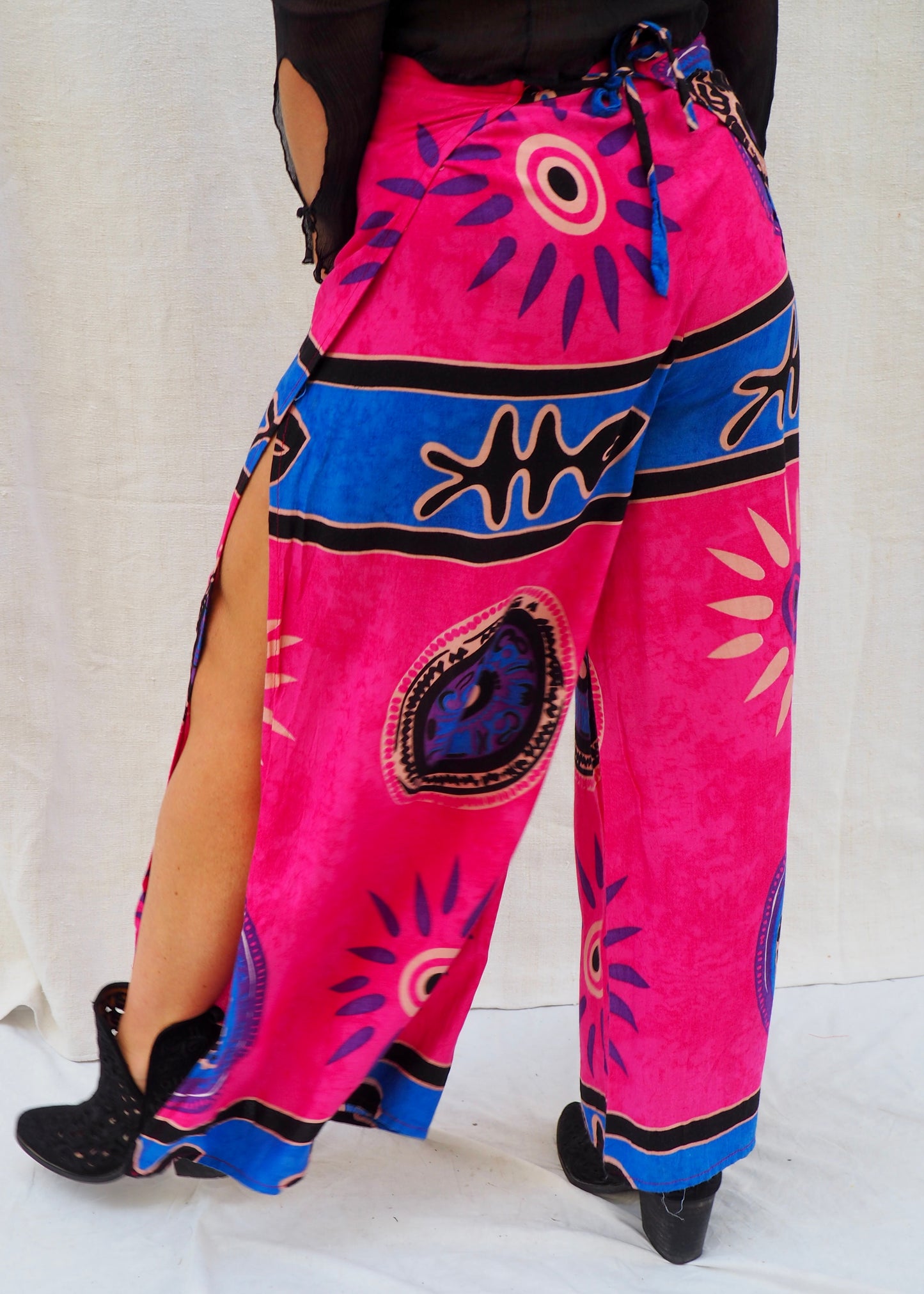 Wrap pants with side splits in pink and blue patterned design