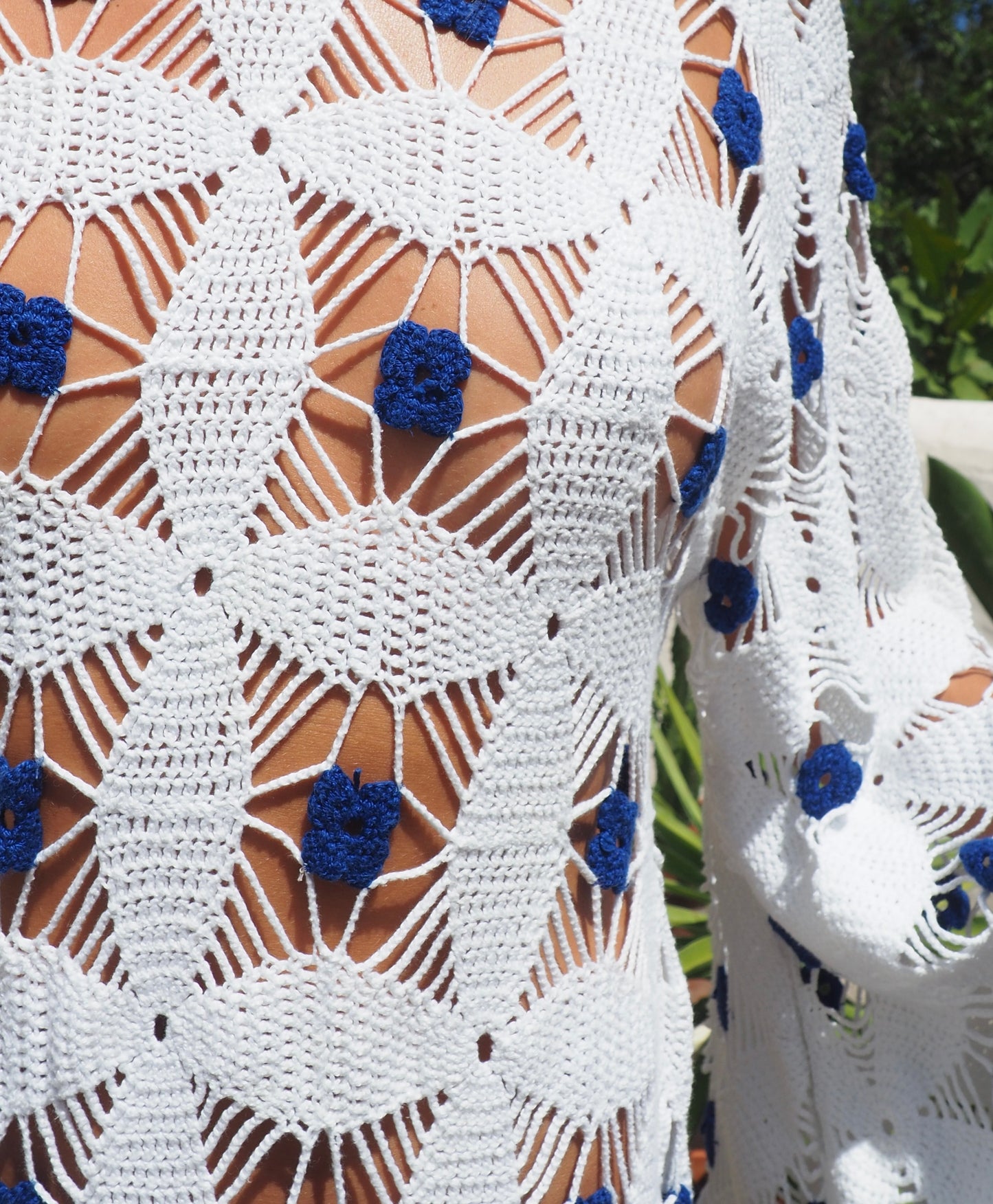 Amazing handmade vintage crochet textiles up-cycled bell sleeve dress with blue flower details by Vagabond Ibiza