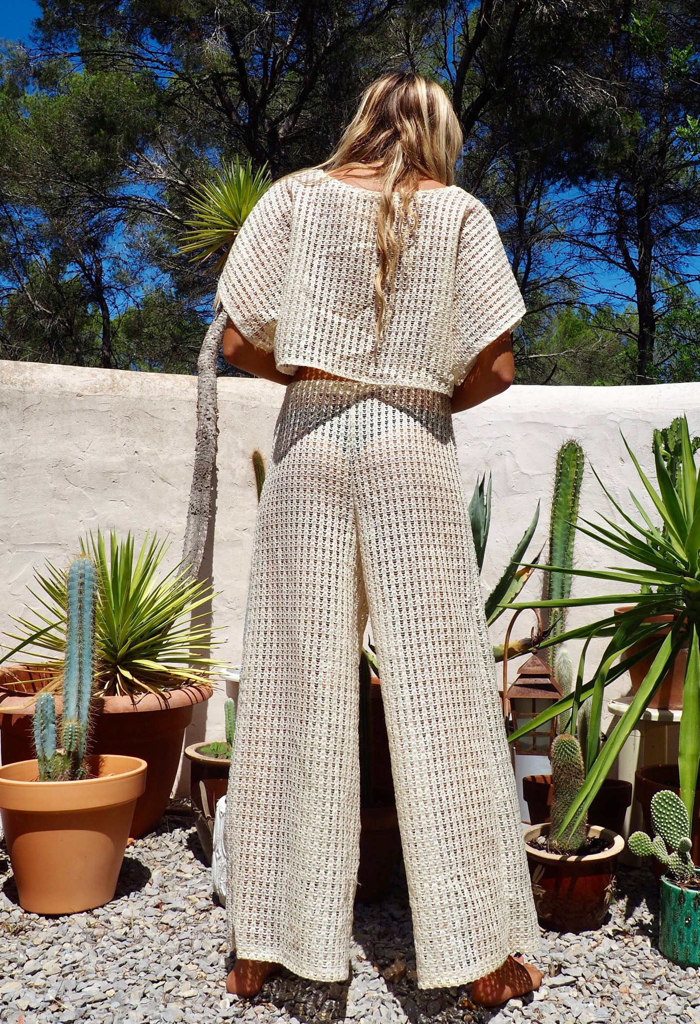 Up-cycled cream mesh woven shear wide leg pants made by Vagabond Ibiza