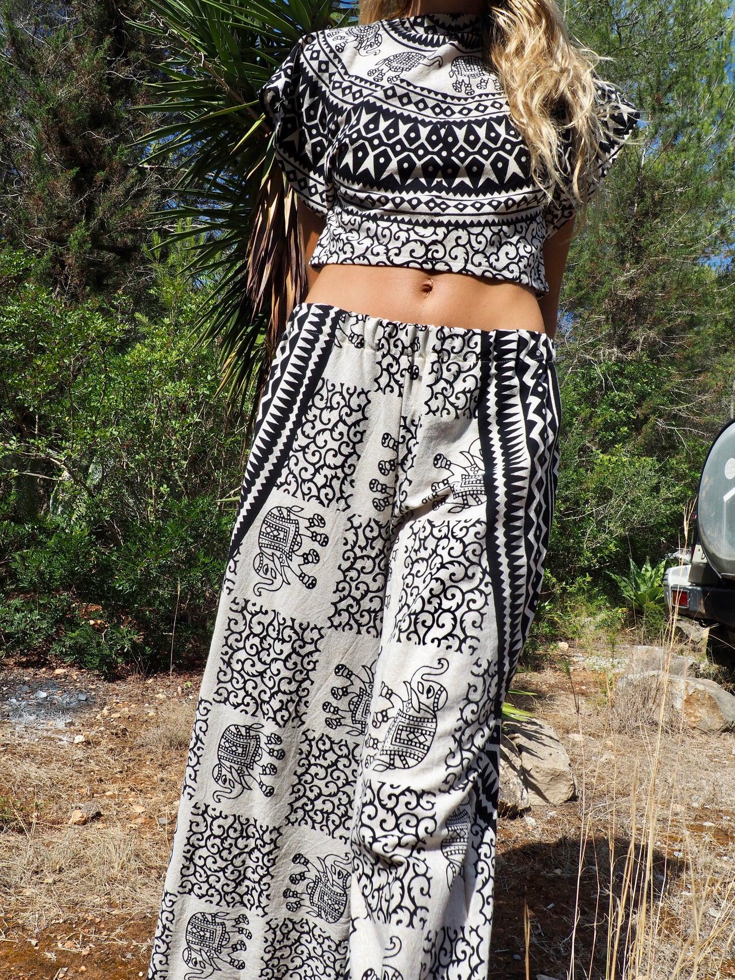 Up-cycled cotton black and cream printed wide leg pants by Vagabond Ibiza