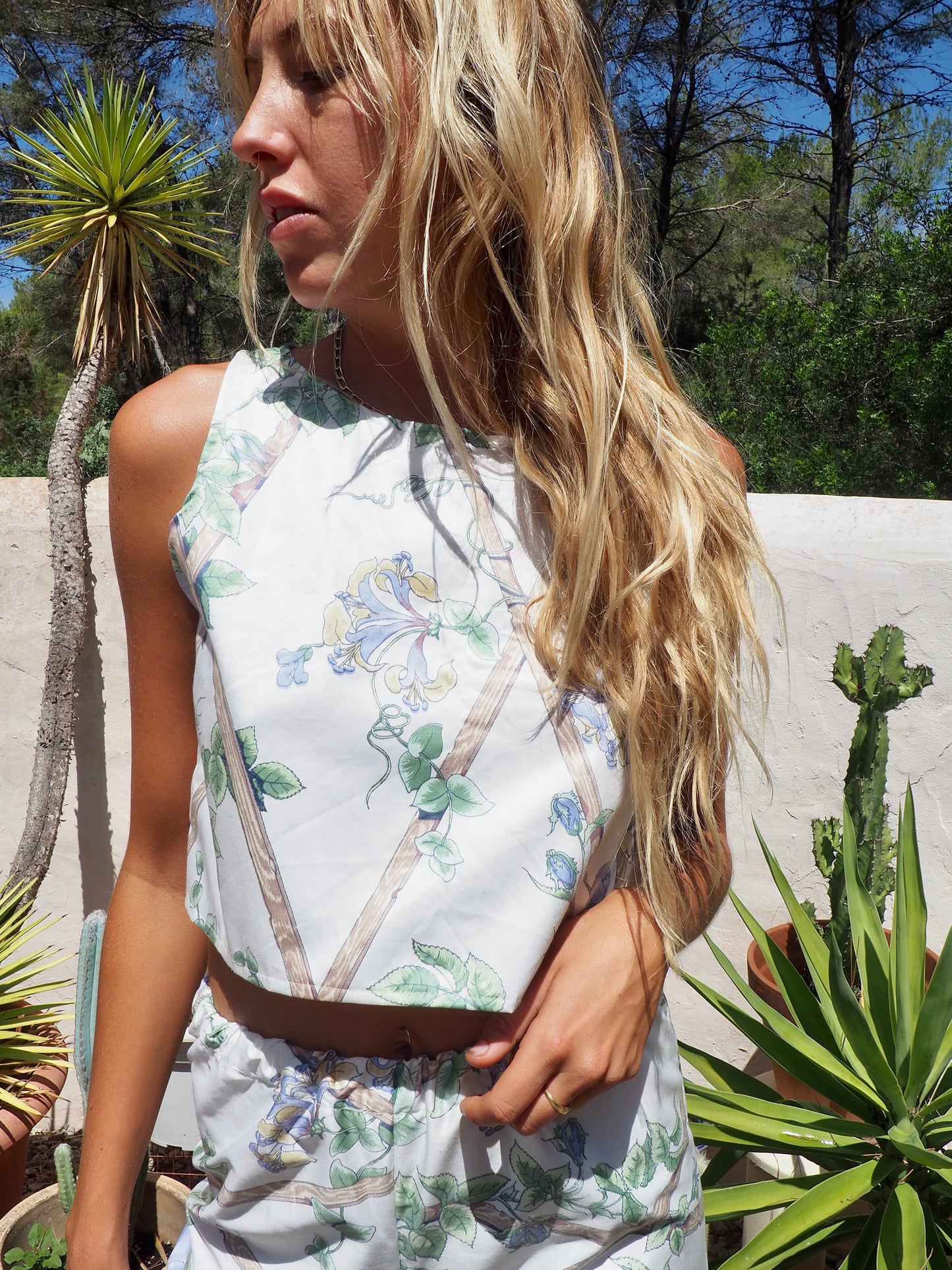 Up-cycled vintage garden floral printed textiles in white and blue crop top by Vagabond Ibiza in