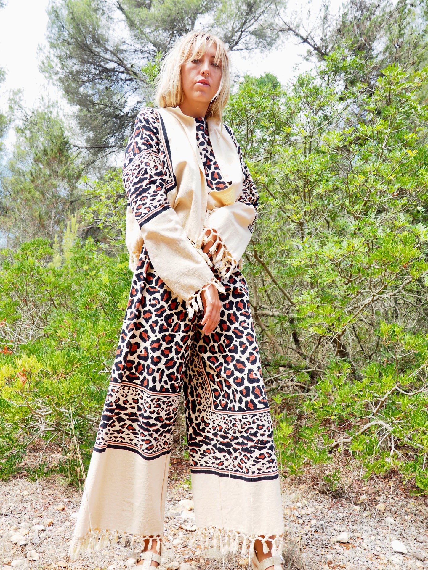 Up-cycled cotton black and cream animal print cropped jacket with tassels made by Vagabond Ibiza