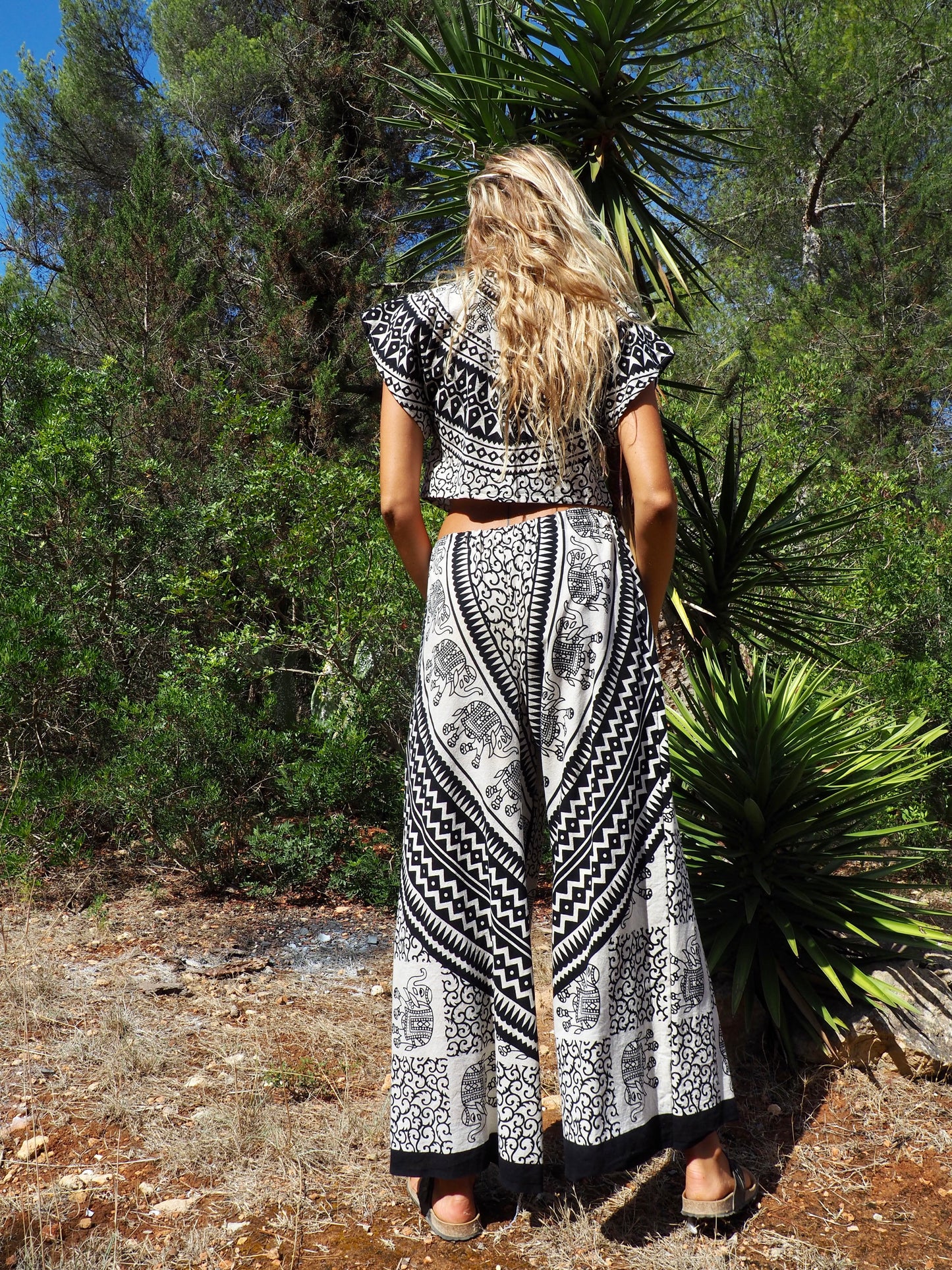 Up-cycled cotton black and cream printed wide leg pants by Vagabond Ibiza