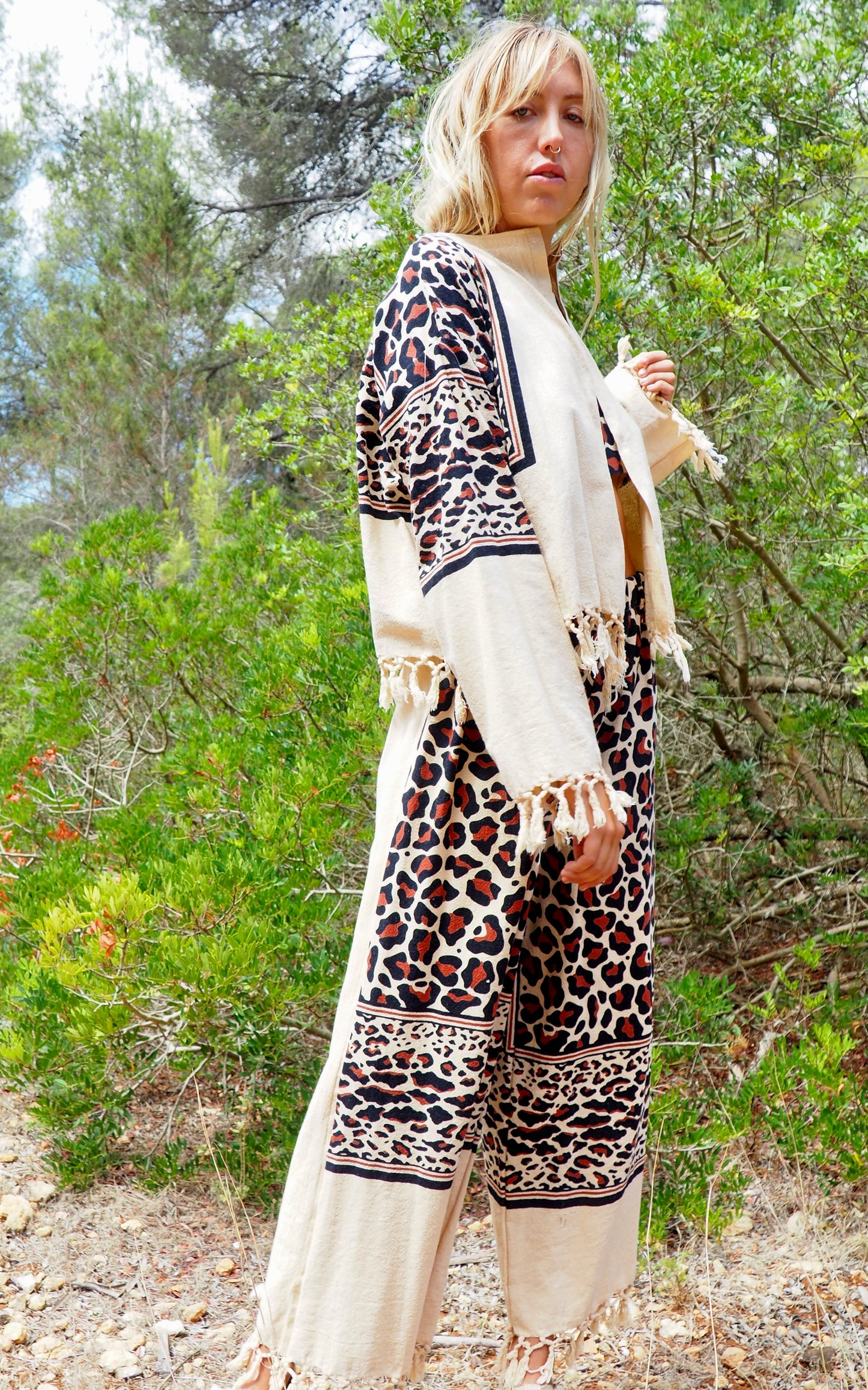 Up-cycled cotton black and cream animal print cropped jacket with tassels made by Vagabond Ibiza