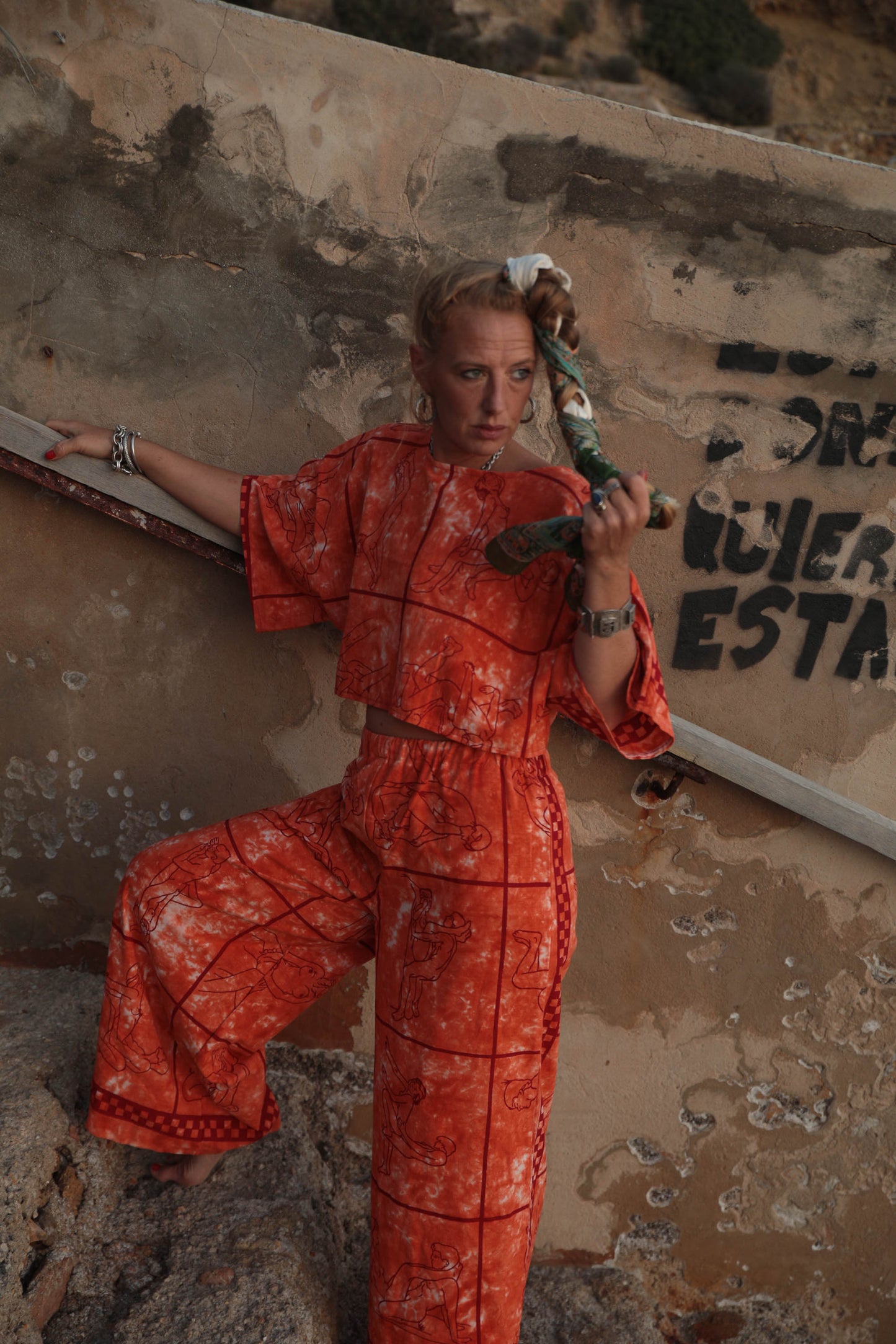 Up-cycled vintage cotton 2 piece set top and pants with printed karma sutra design in bright orange.