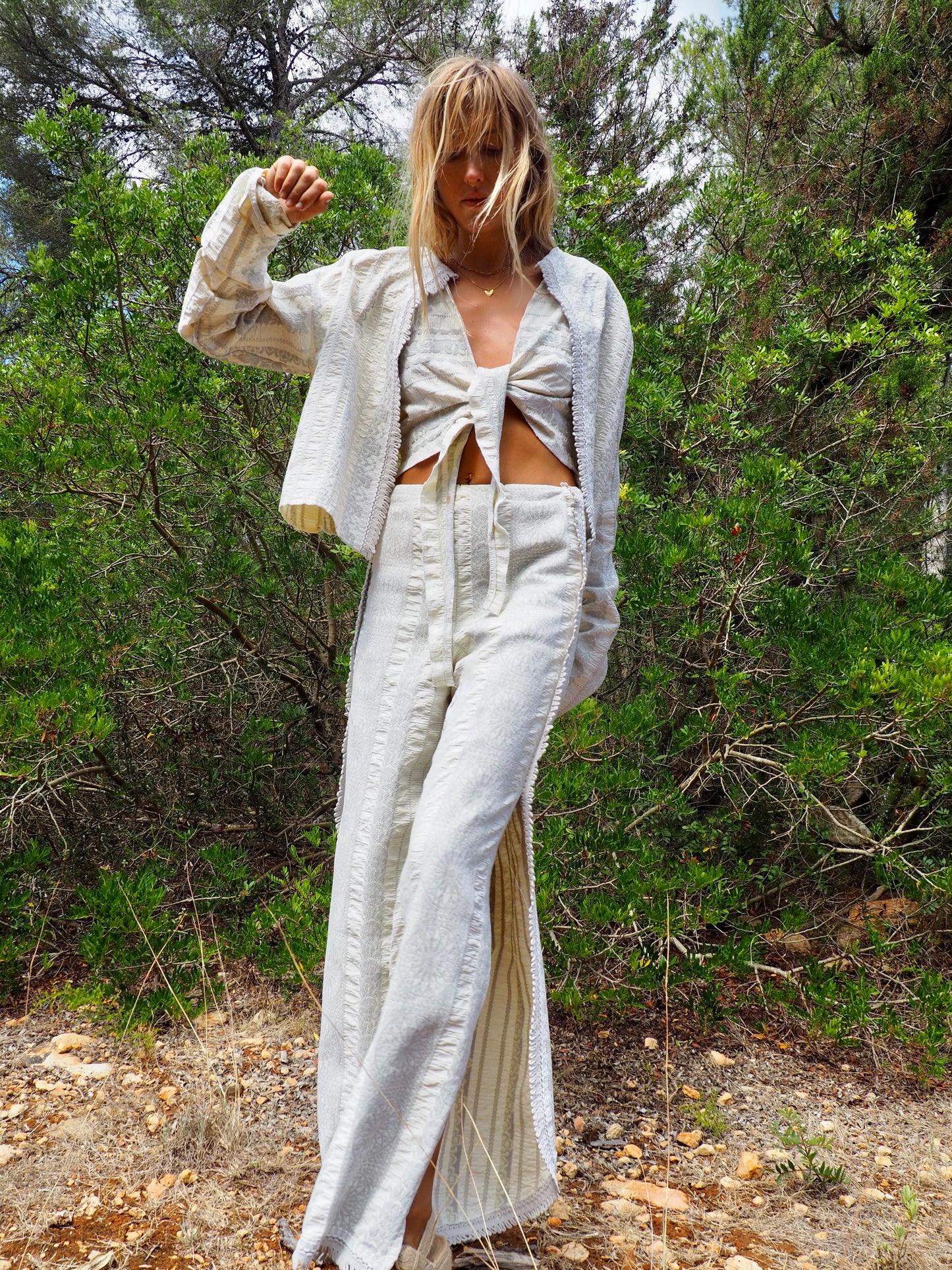 Up-cycled heavy cream and gray cotton woven textile reversible crop top for 2 different styles made by Vagabond Ibiza