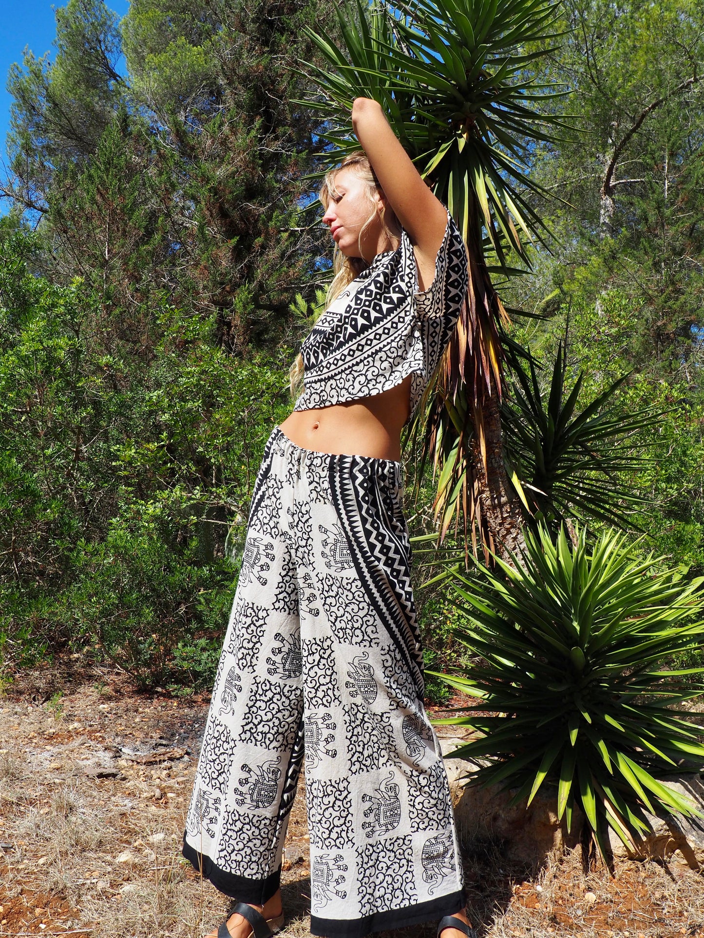 Up-cycled cotton black and cream printed wide leg pants by Vagabond Ibiza