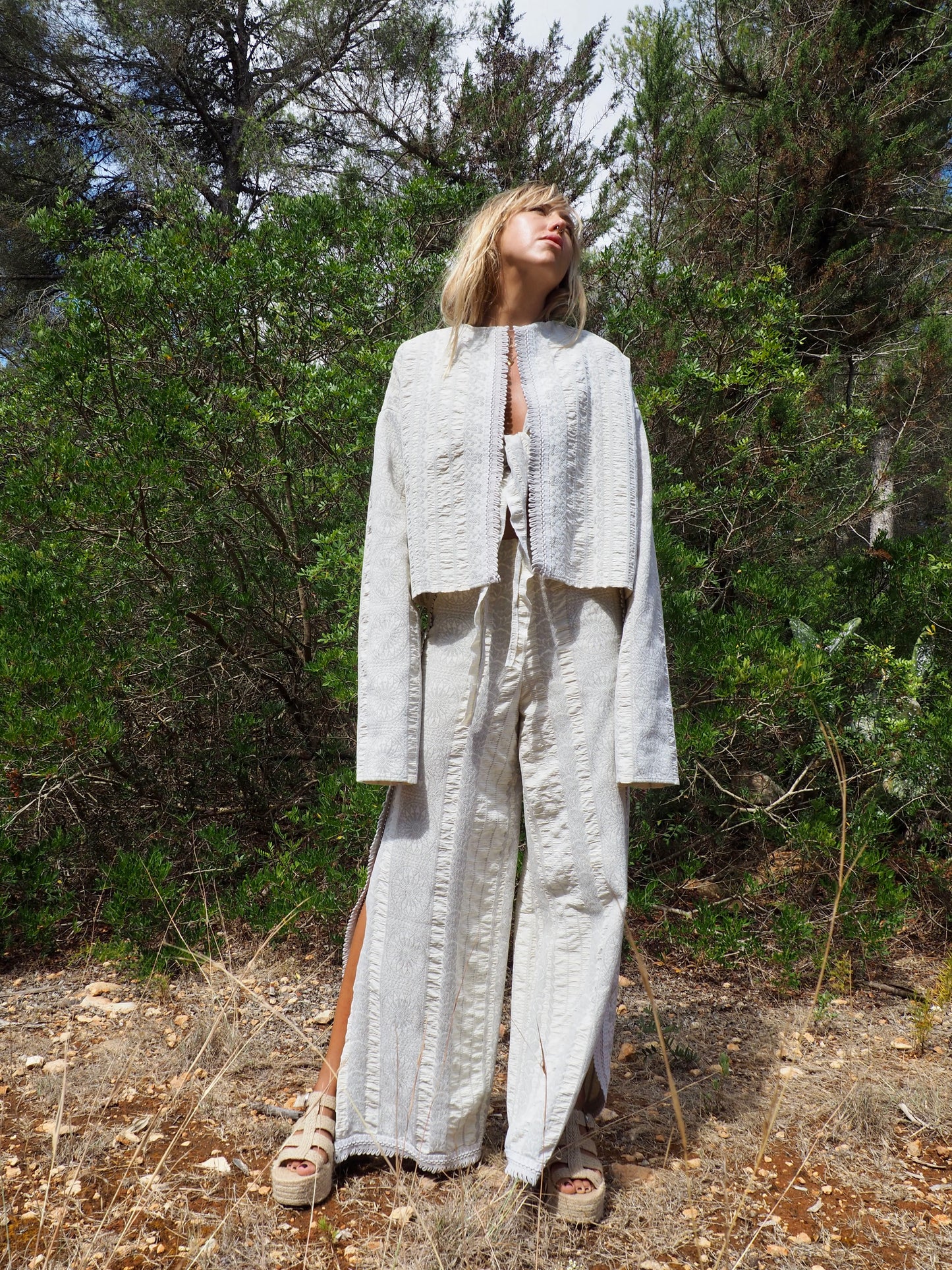 Up-cycled heavy cotton woven textile cropped jacket with super cool oversize long sleeves can be worn long as a statement made by Vagabond Ibiza