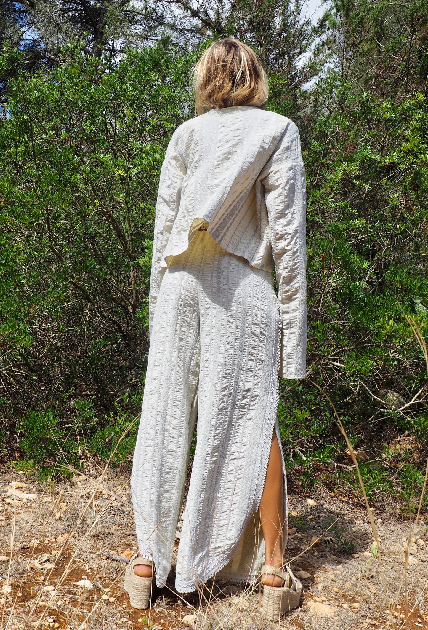 Up-cycled heavy cotton woven textile cropped jacket with super cool oversize long sleeves can be worn long as a statement made by Vagabond Ibiza