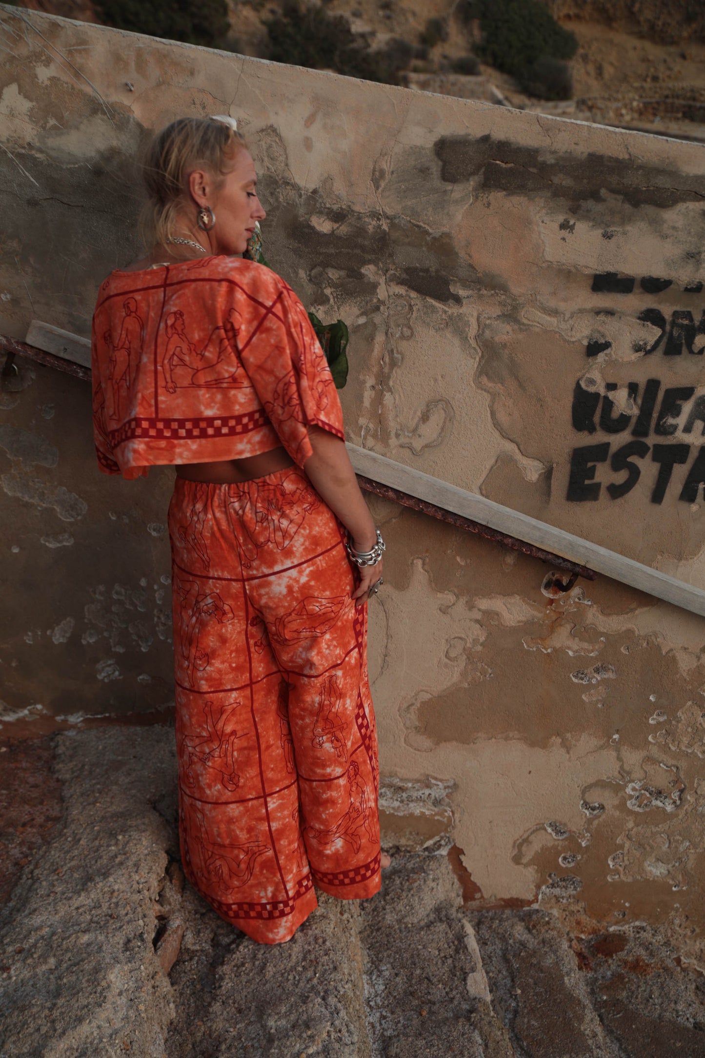 Up-cycled vintage cotton 2 piece set top and pants with printed karma sutra design in bright orange.