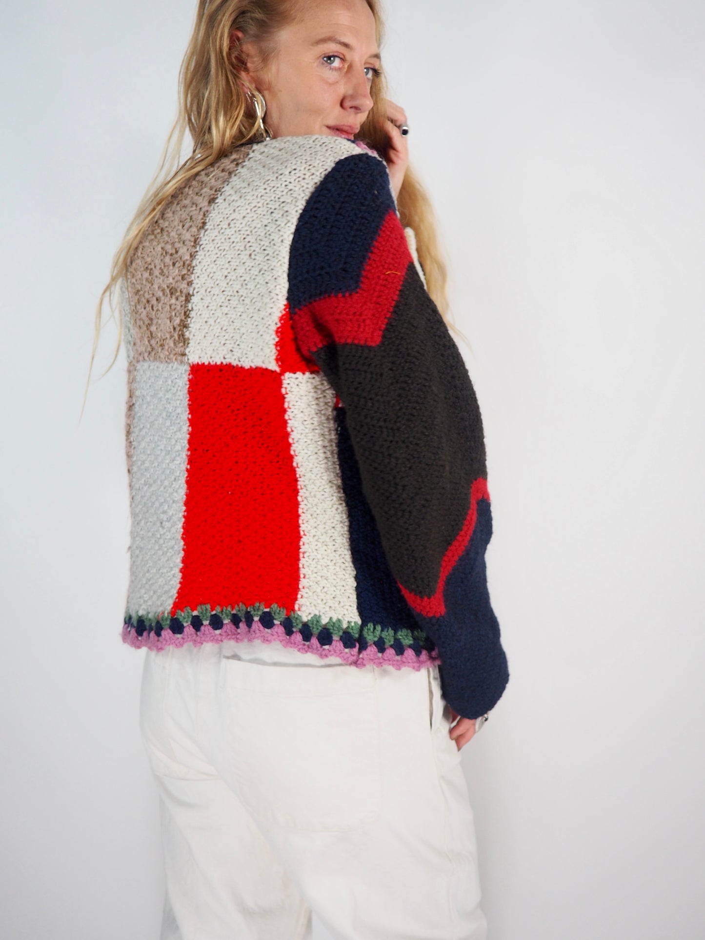 This one-of-a-kind vintage jacket is a true statement piece, crafted from a mix of cotton and wool crochet