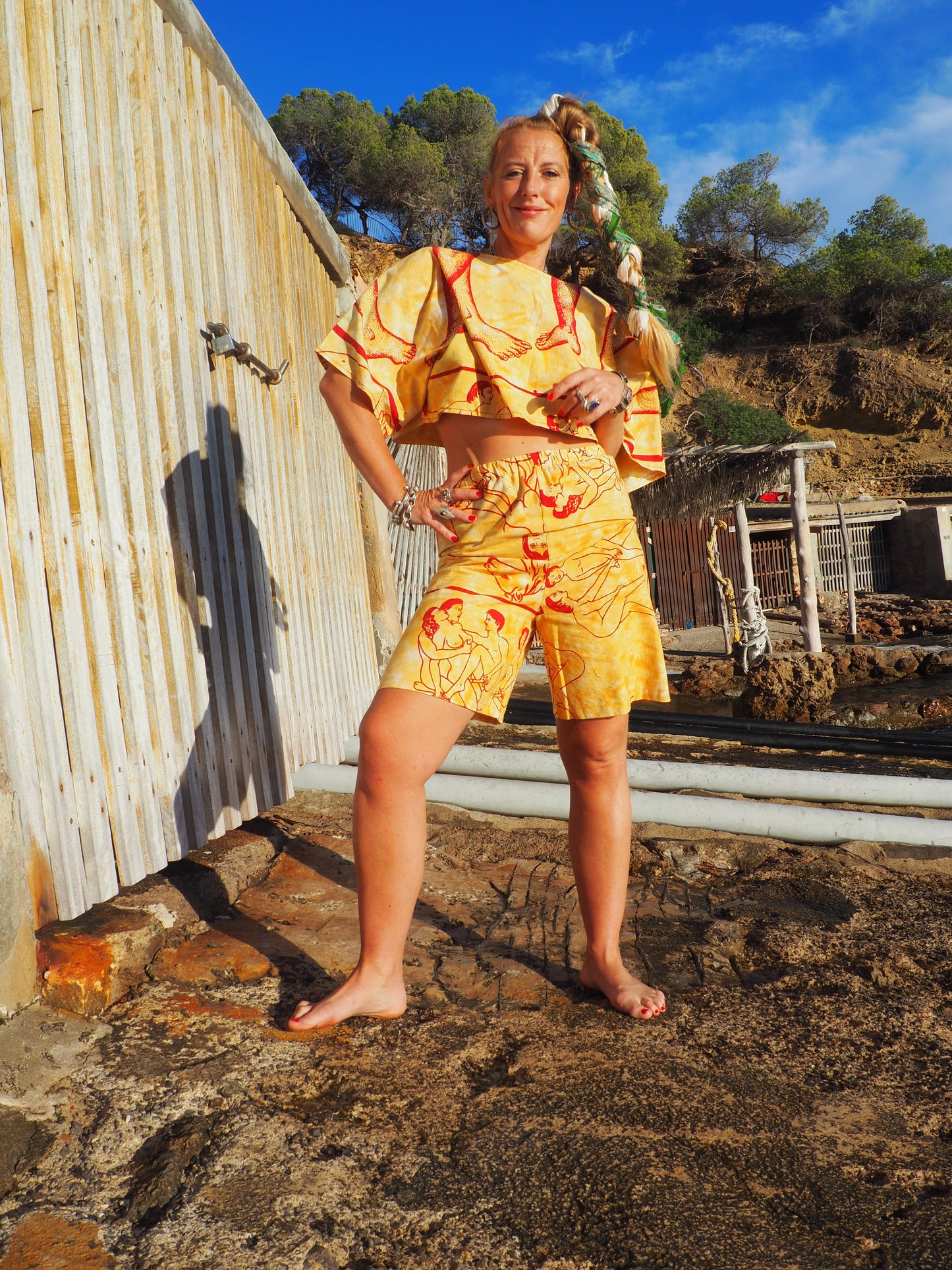 Up-cycled vintage cotton shorts with elastic waist and  printed karma sutra design mellow yellow