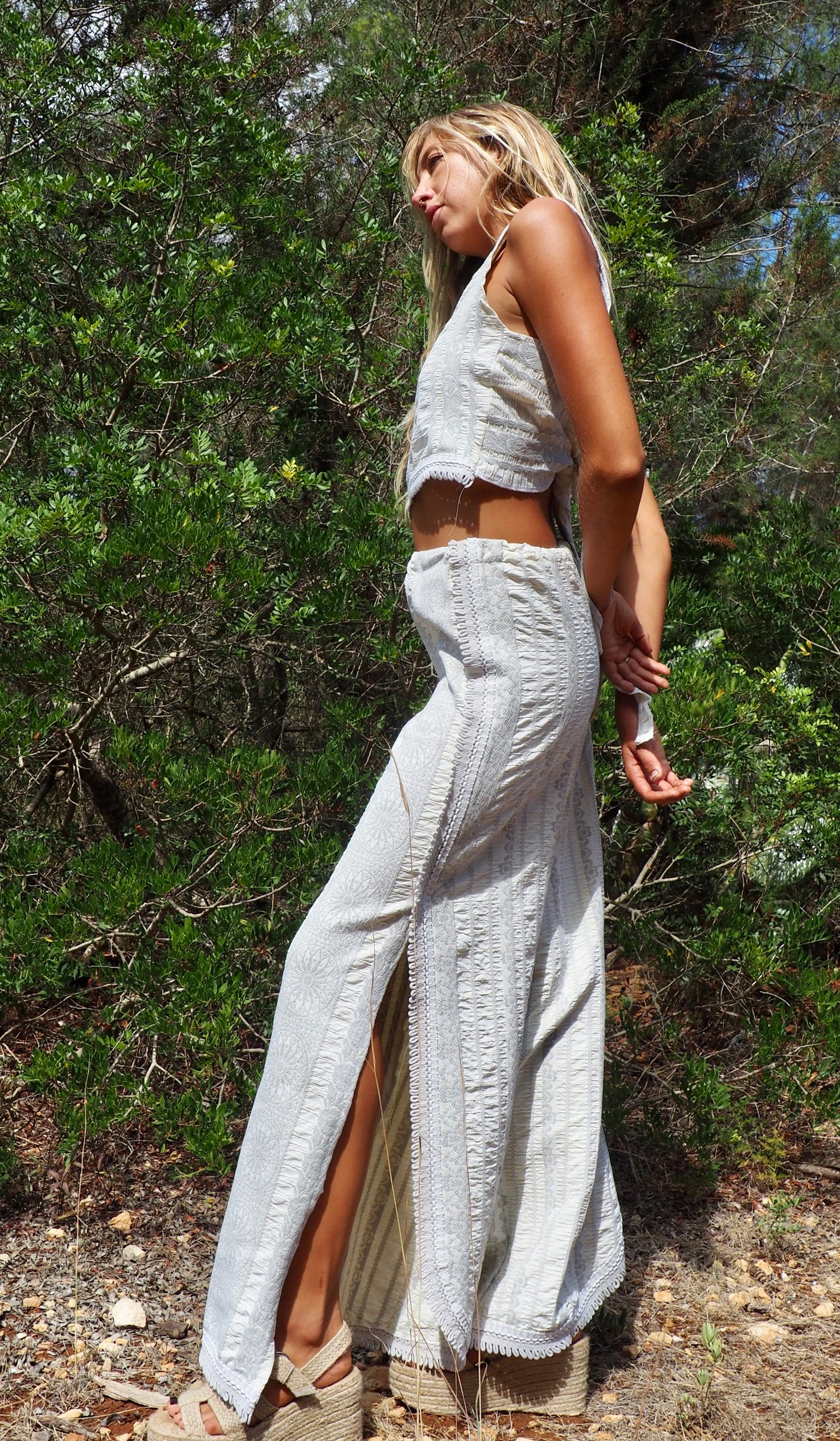 Up-cycled heavy cream and gray cotton woven textile wide leg pants with elastics and waist and side split details made by Vagabond Ibiza