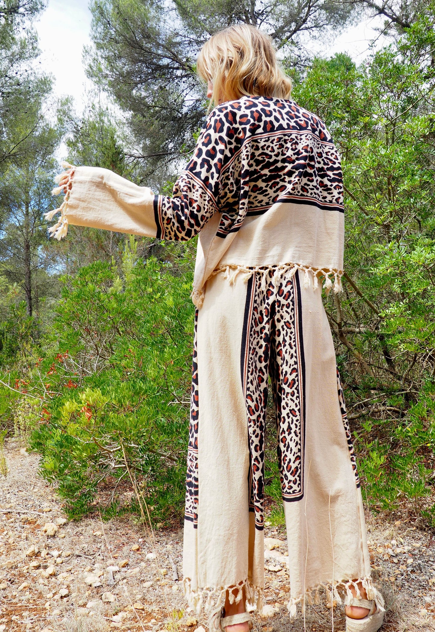 Up-cycled cotton black and cream animal print cropped jacket with tassels made by Vagabond Ibiza