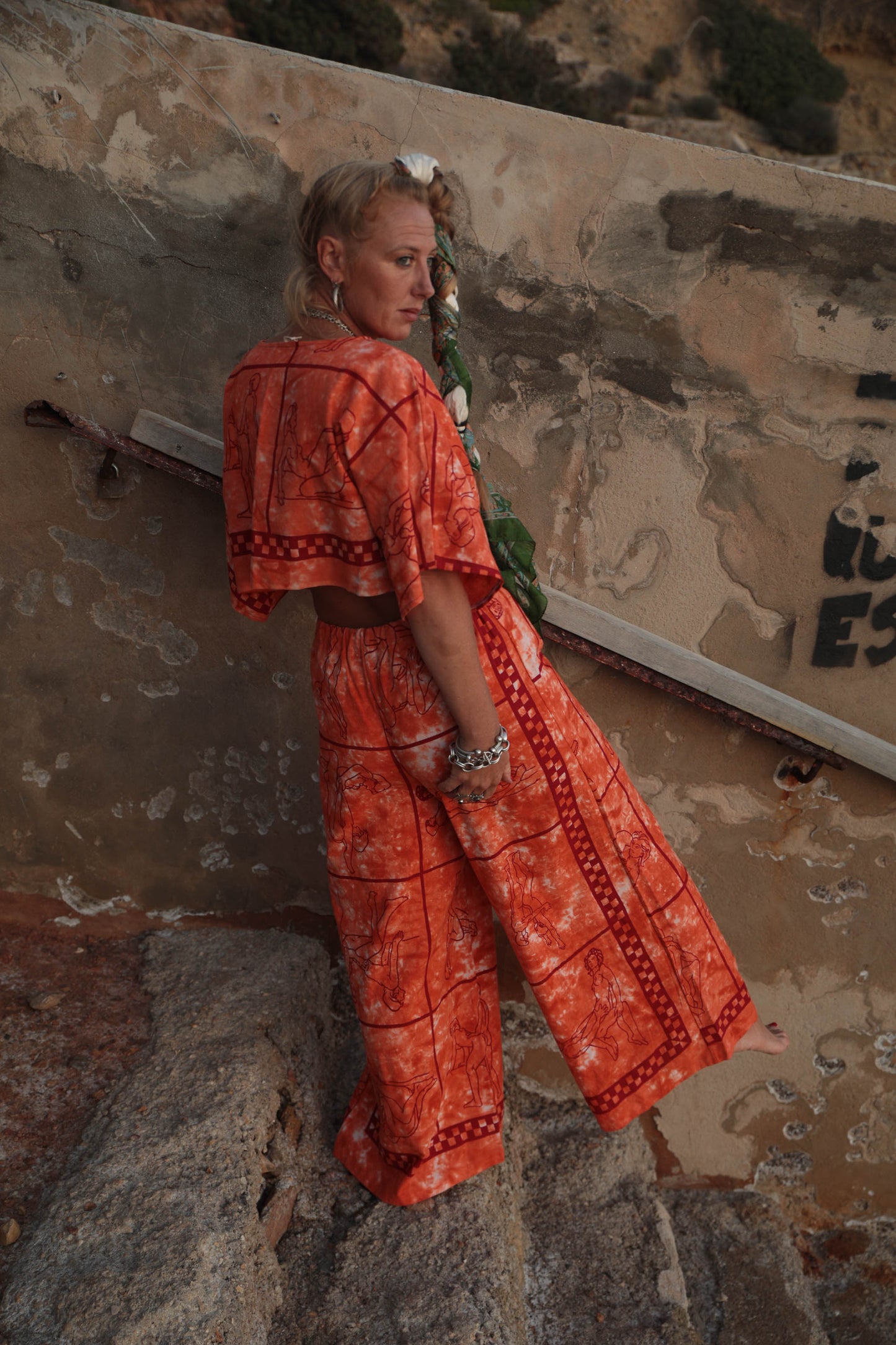 Up-cycled vintage cotton 2 piece set top and pants with printed karma sutra design in bright orange.