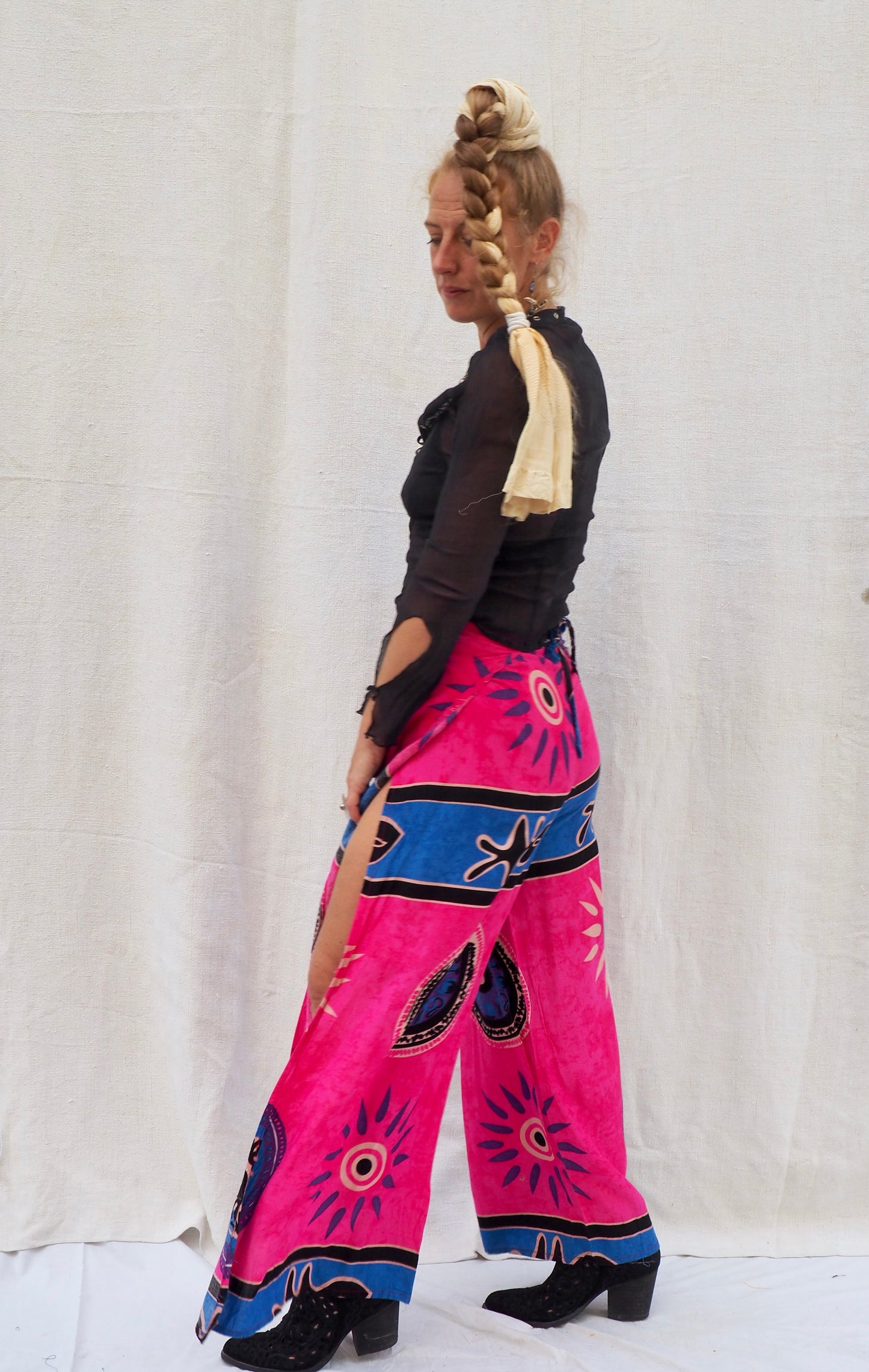 Wrap pants with side splits in pink and blue patterned design