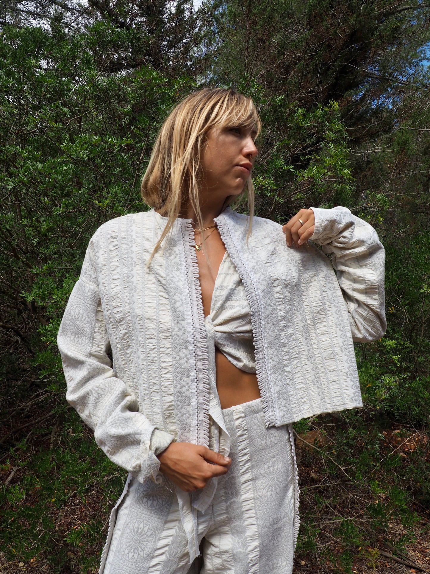 Up-cycled heavy cotton woven textile cropped jacket with super cool oversize long sleeves can be worn long as a statement made by Vagabond Ibiza