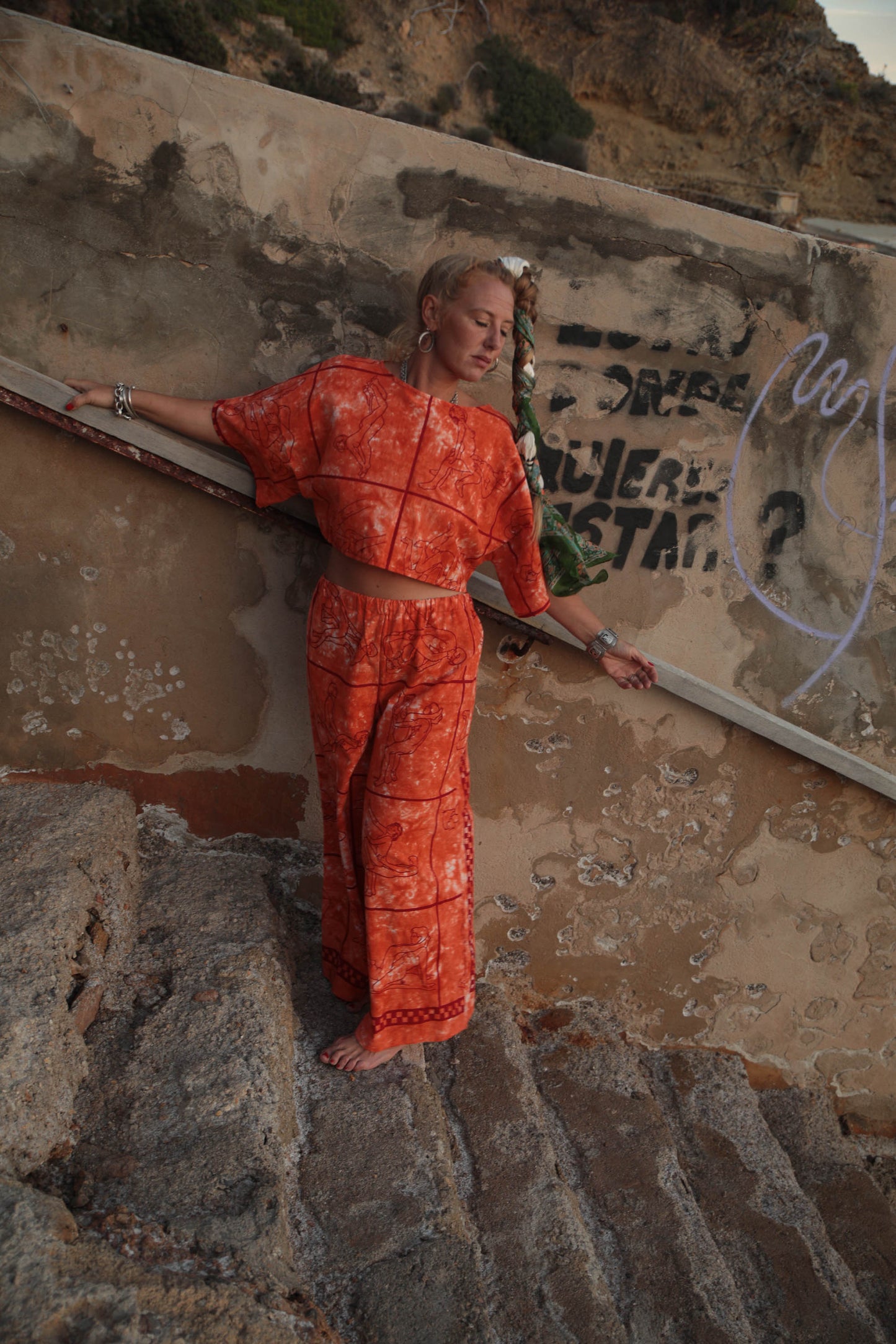 Up-cycled vintage cotton 2 piece set top and pants with printed karma sutra design in bright orange.