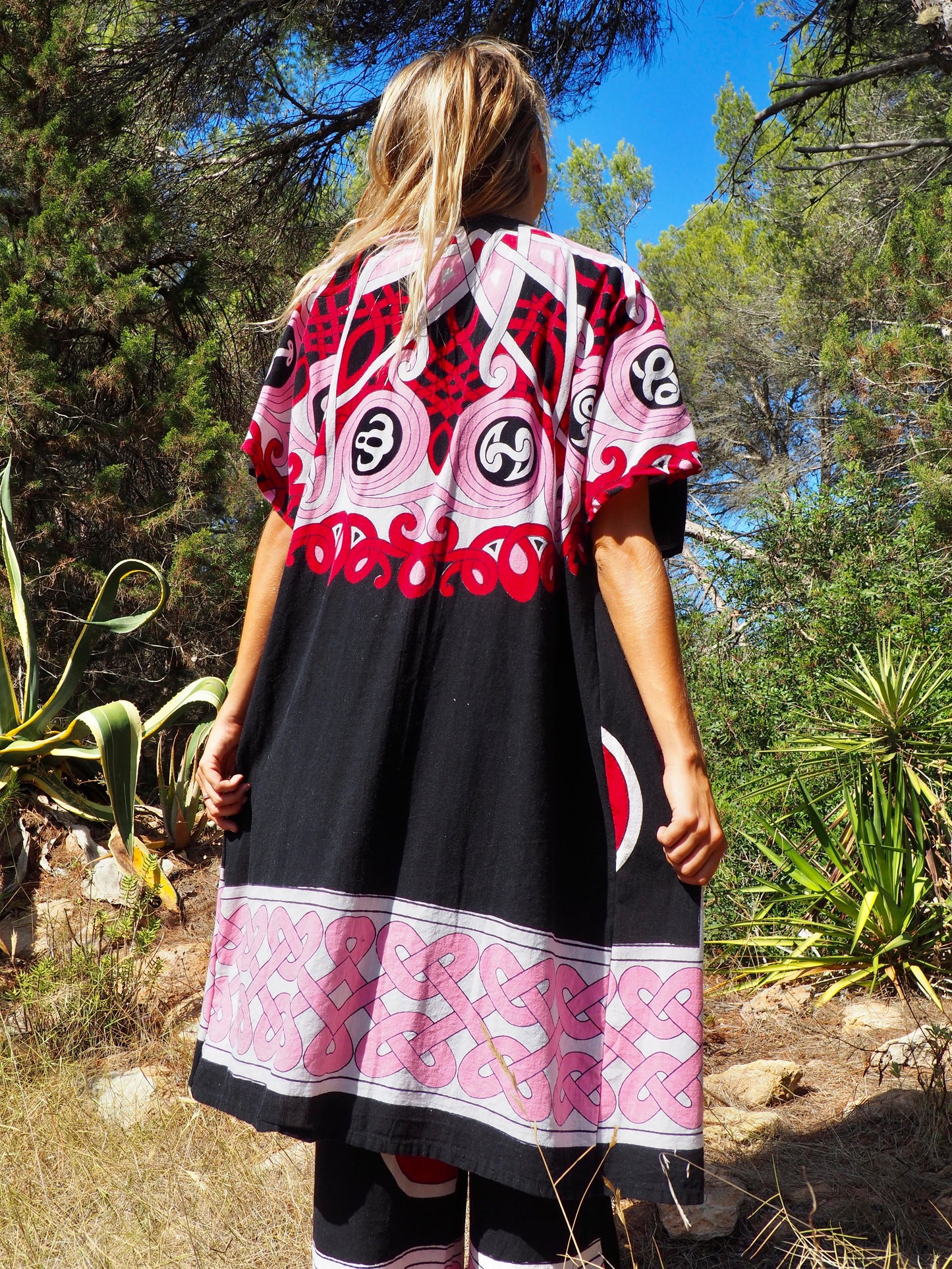 Up-cycled cotton short sleeve kimono jacket in pink and black with vibrant print design and circular motifs by Vagabond Ibiza
