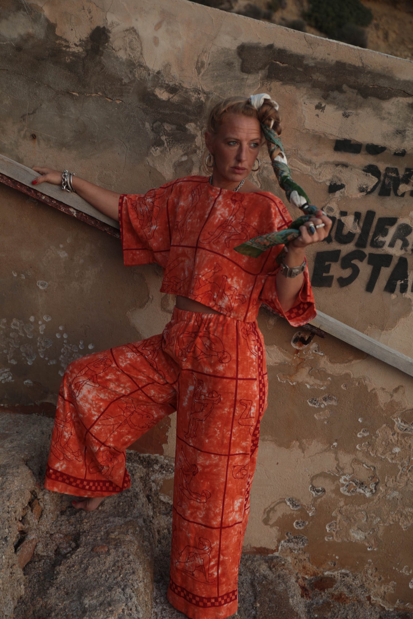 Up-cycled vintage cotton 2 piece set top and pants with printed karma sutra design in bright orange.