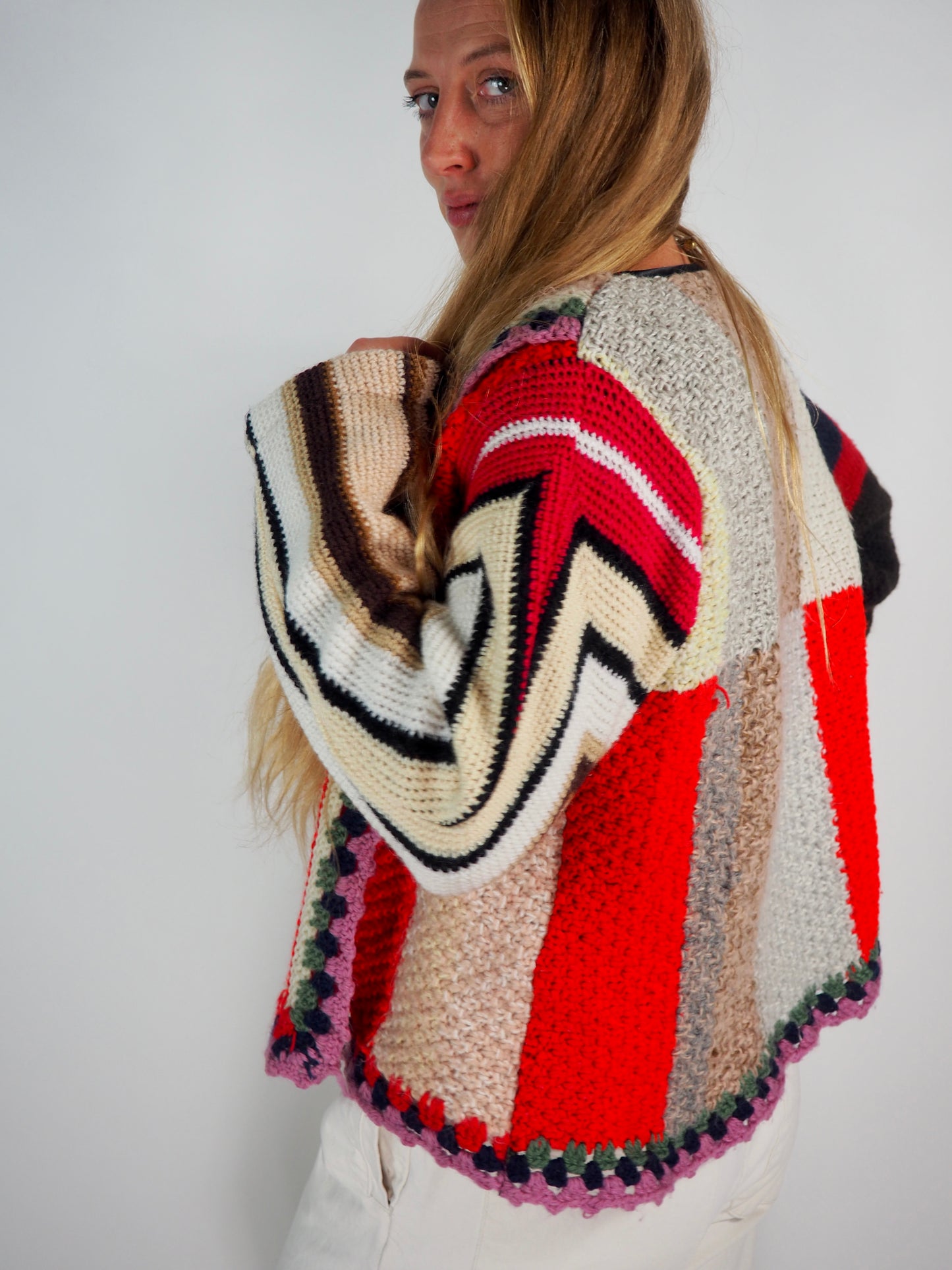 This one-of-a-kind vintage jacket is a true statement piece, crafted from a mix of cotton and wool crochet