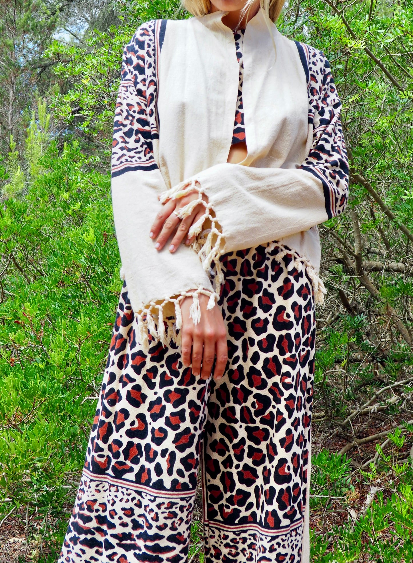 Up-cycled cotton black and cream animal print cropped jacket with tassels made by Vagabond Ibiza