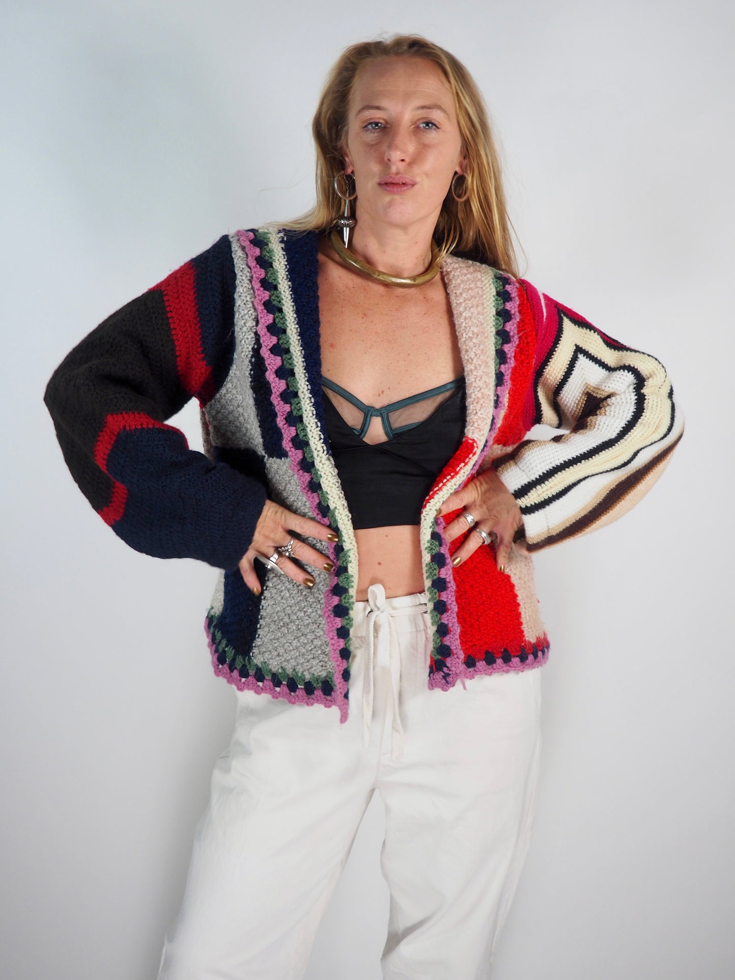 This one-of-a-kind vintage jacket is a true statement piece, crafted from a mix of cotton and wool crochet