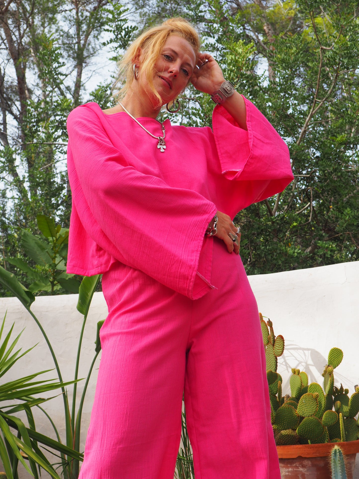 Bright bright pink elasticated waist wide leg pants made by Vagabond Ibiza top is now sold