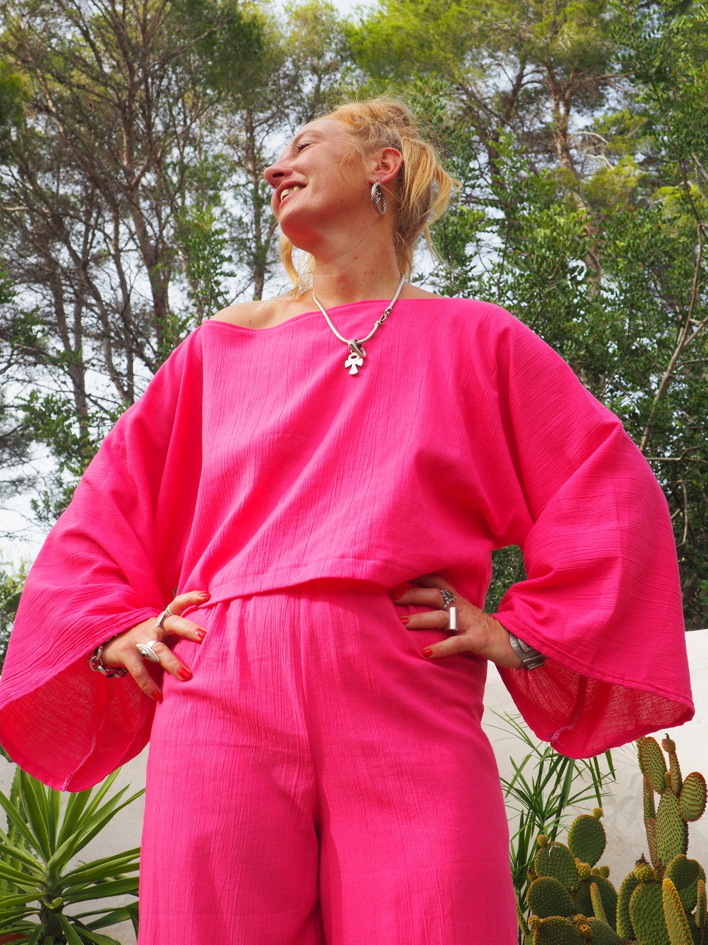 Bright bright pink elasticated waist wide leg pants made by Vagabond Ibiza top is now sold