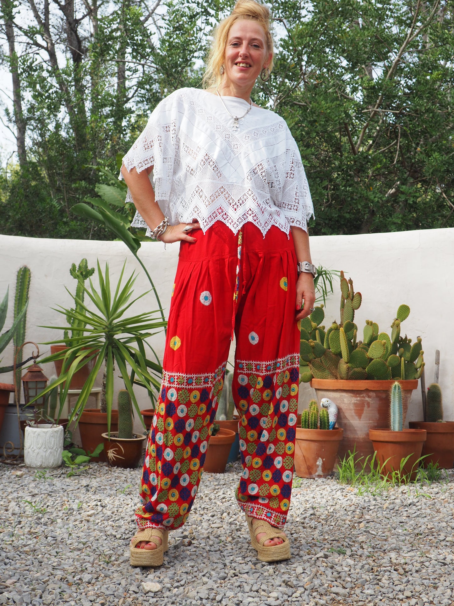 Original vintage 1970’s Indian hand embroidered pants on bright red cotton textiles and a draw string waist very cool