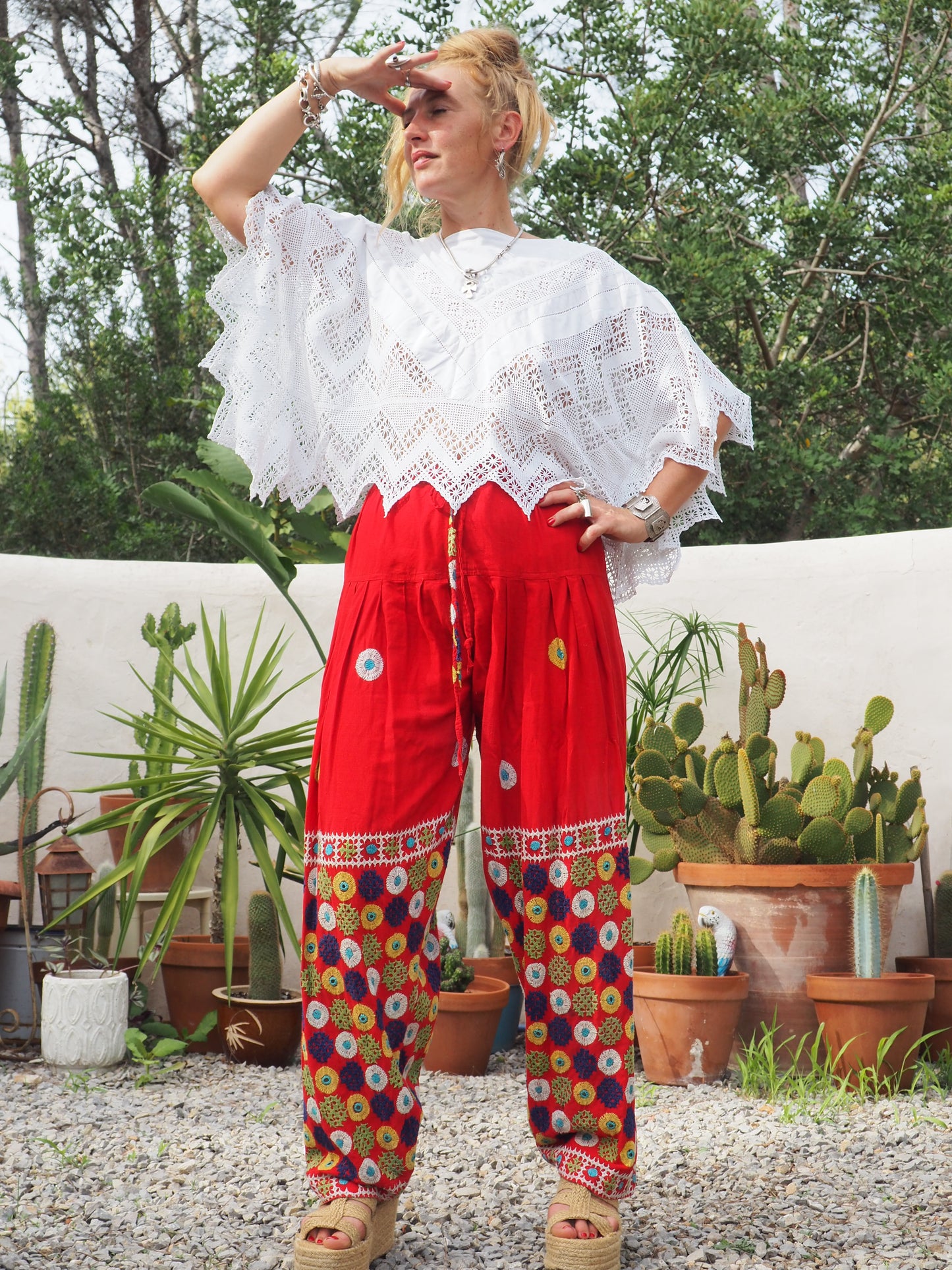 Original vintage 1970’s Indian hand embroidered pants on bright red cotton textiles and a draw string waist very cool