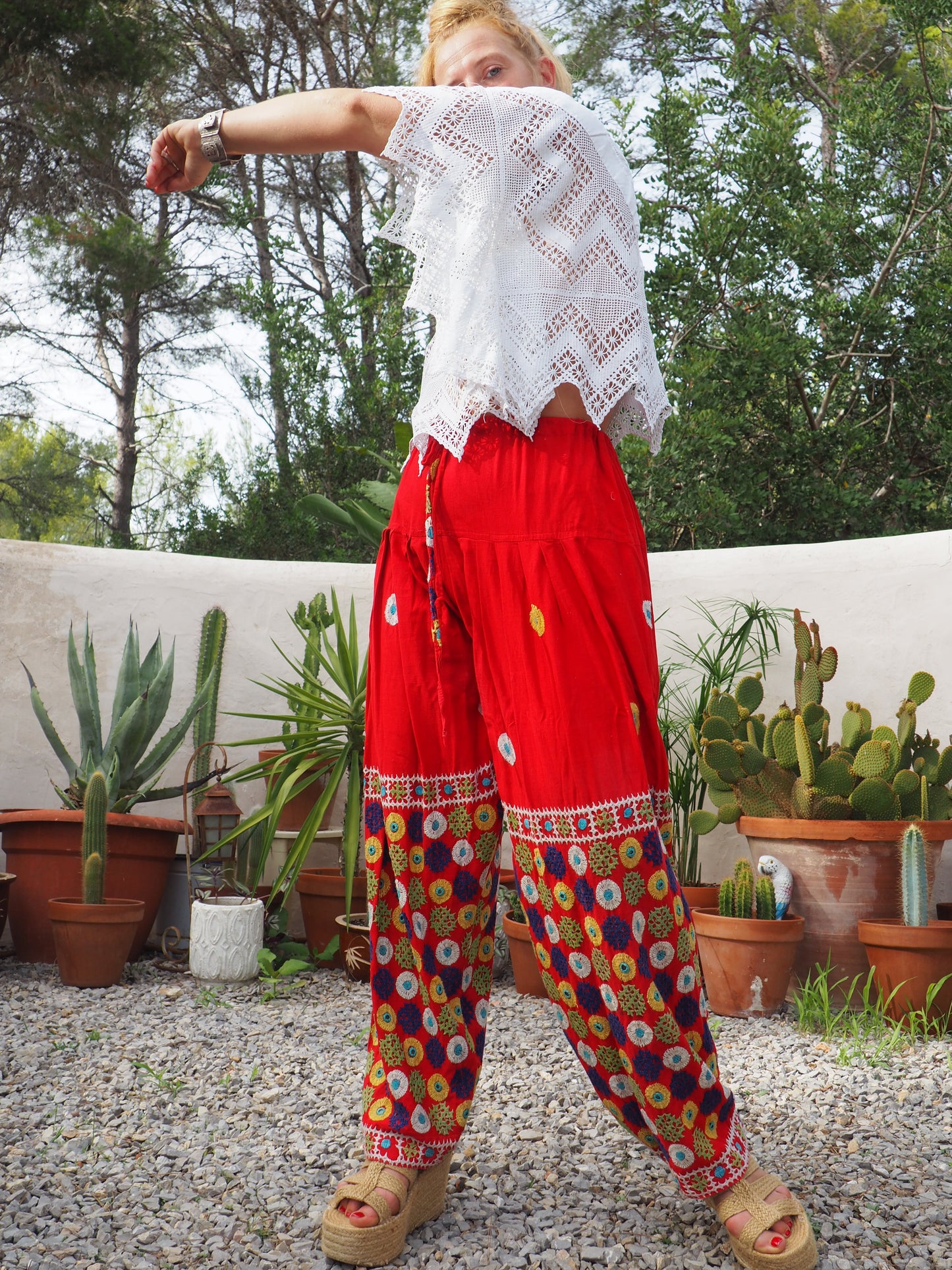 Original vintage 1970’s Indian hand embroidered pants on bright red cotton textiles and a draw string waist very cool