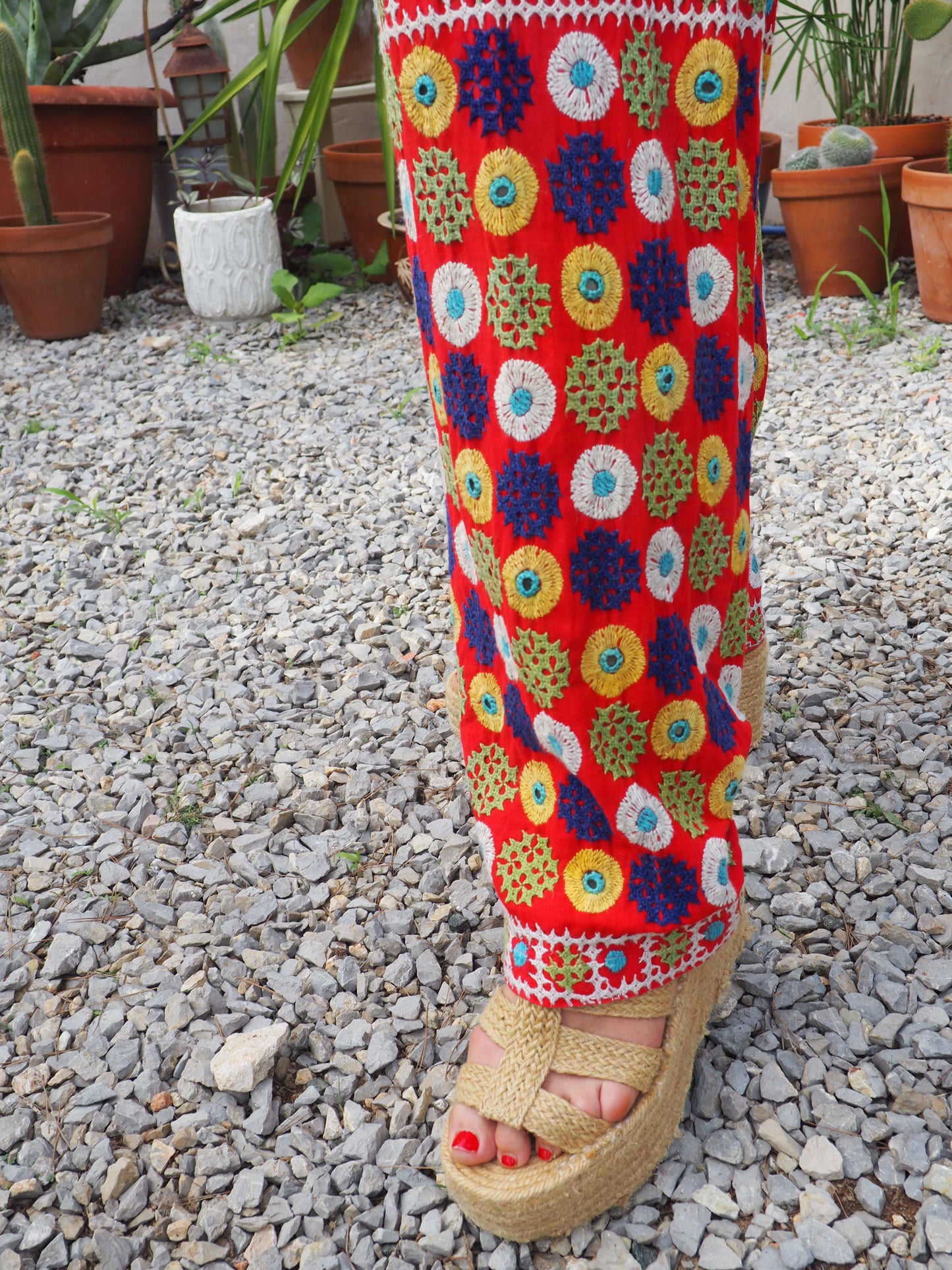 Original vintage 1970’s Indian hand embroidered pants on bright red cotton textiles and a draw string waist very cool